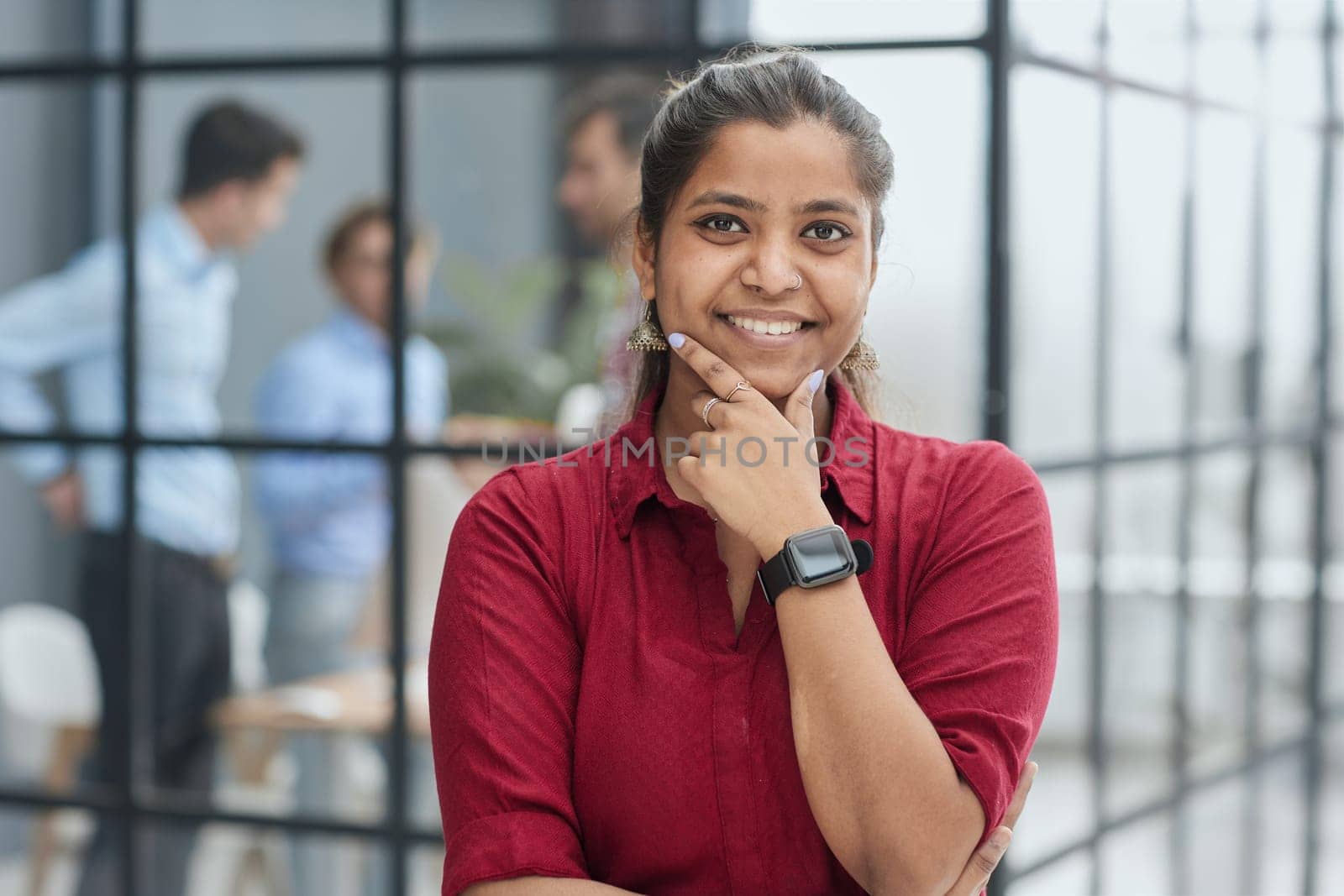 Closeup portrait of attractive business woman smiling at camera