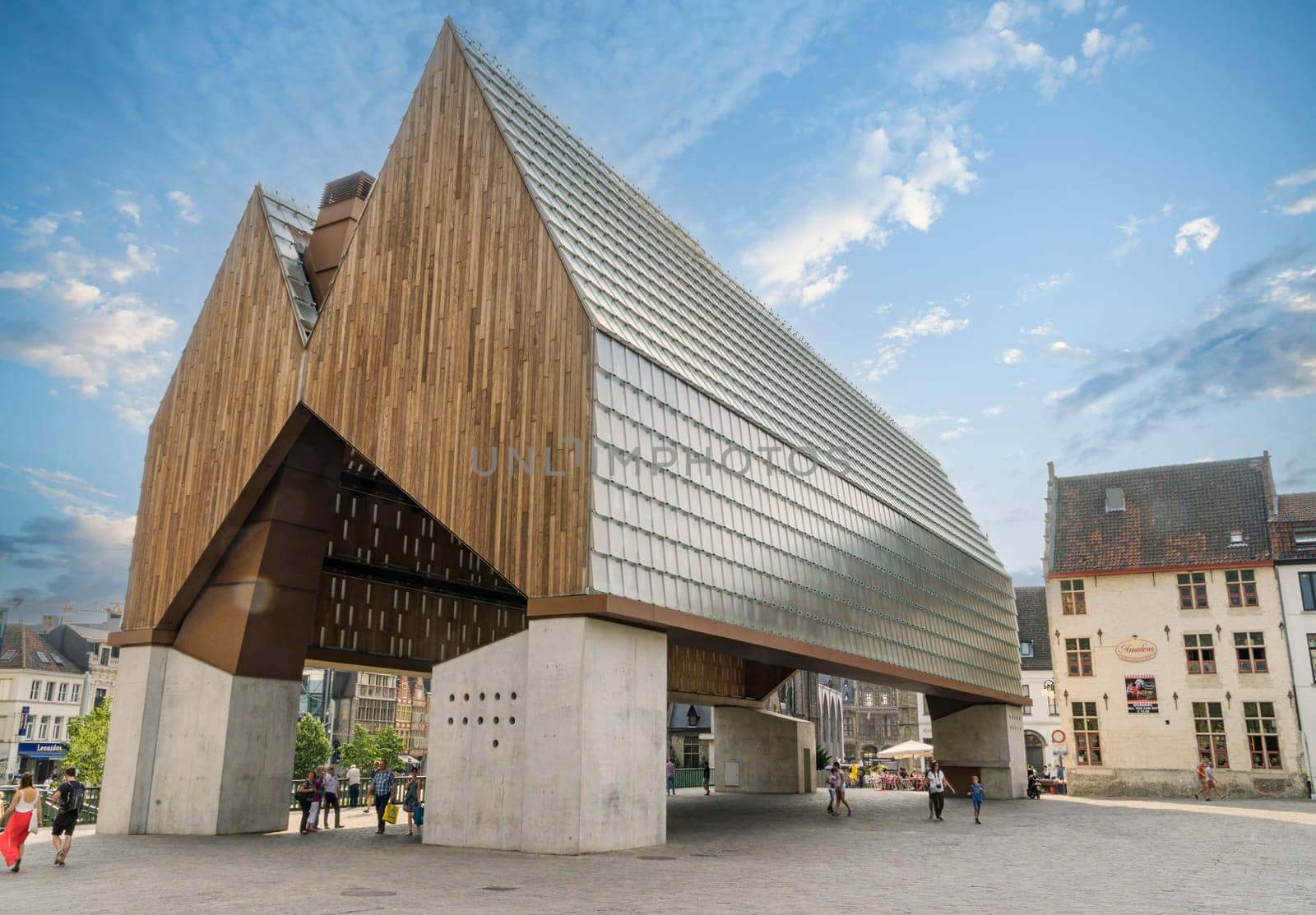 View of the modern Market Hall building. Modern architecture with a combination of glass, wood and concrete in the center of the Belgian city of Ghent.