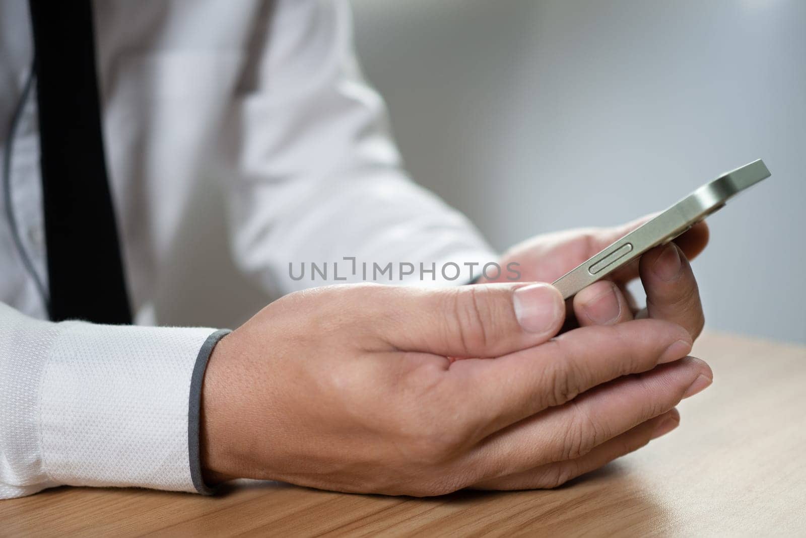 Business people use phones to communicate and work. communication technology concept by Unimages2527