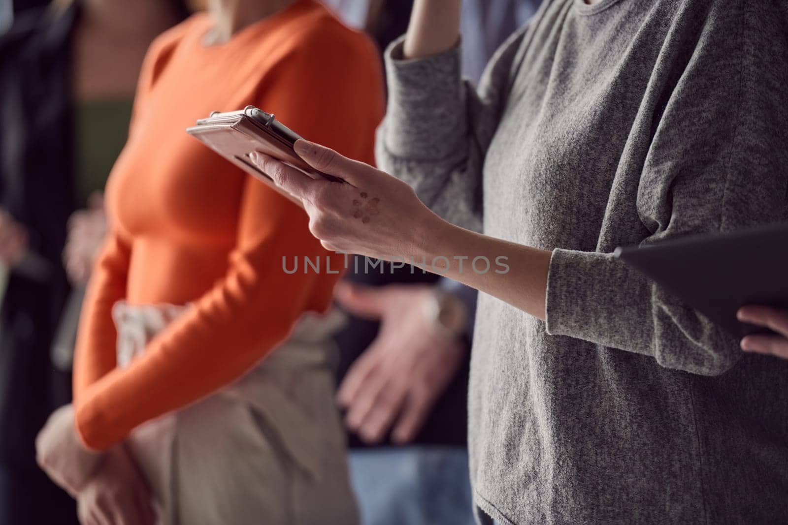 Closeup photo of a woman using a smartphone. High quality photo