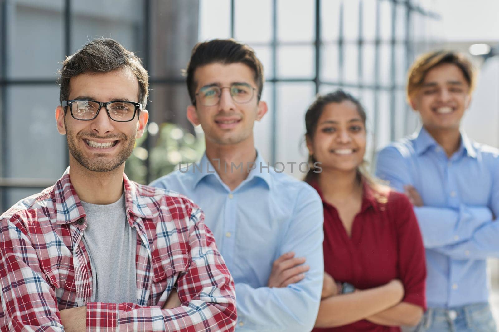 successful diverse international business team coworkers capable reliable professional specialists posing at office