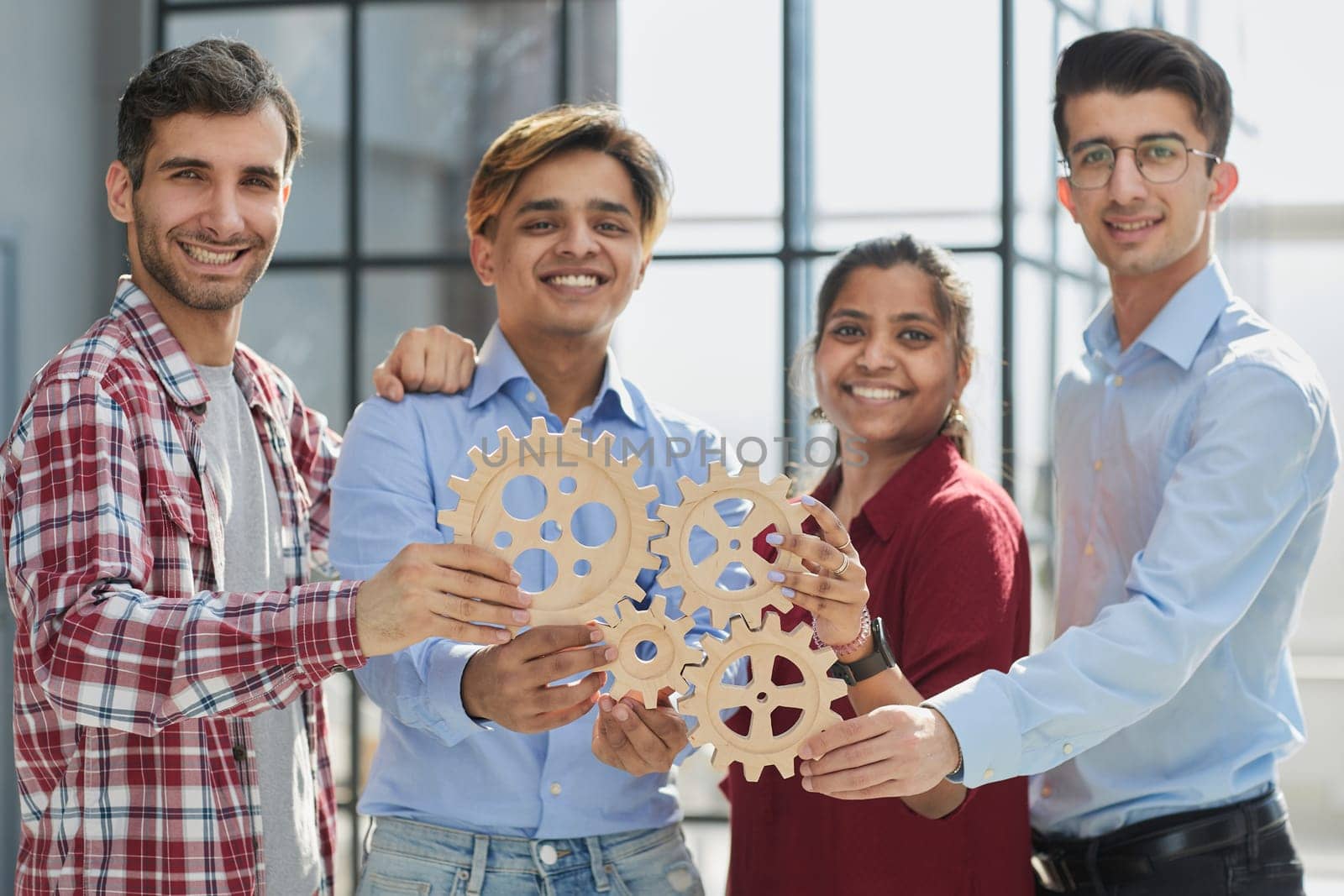 Business team connect pieces of gears. Teamwork, partnership and integration concept