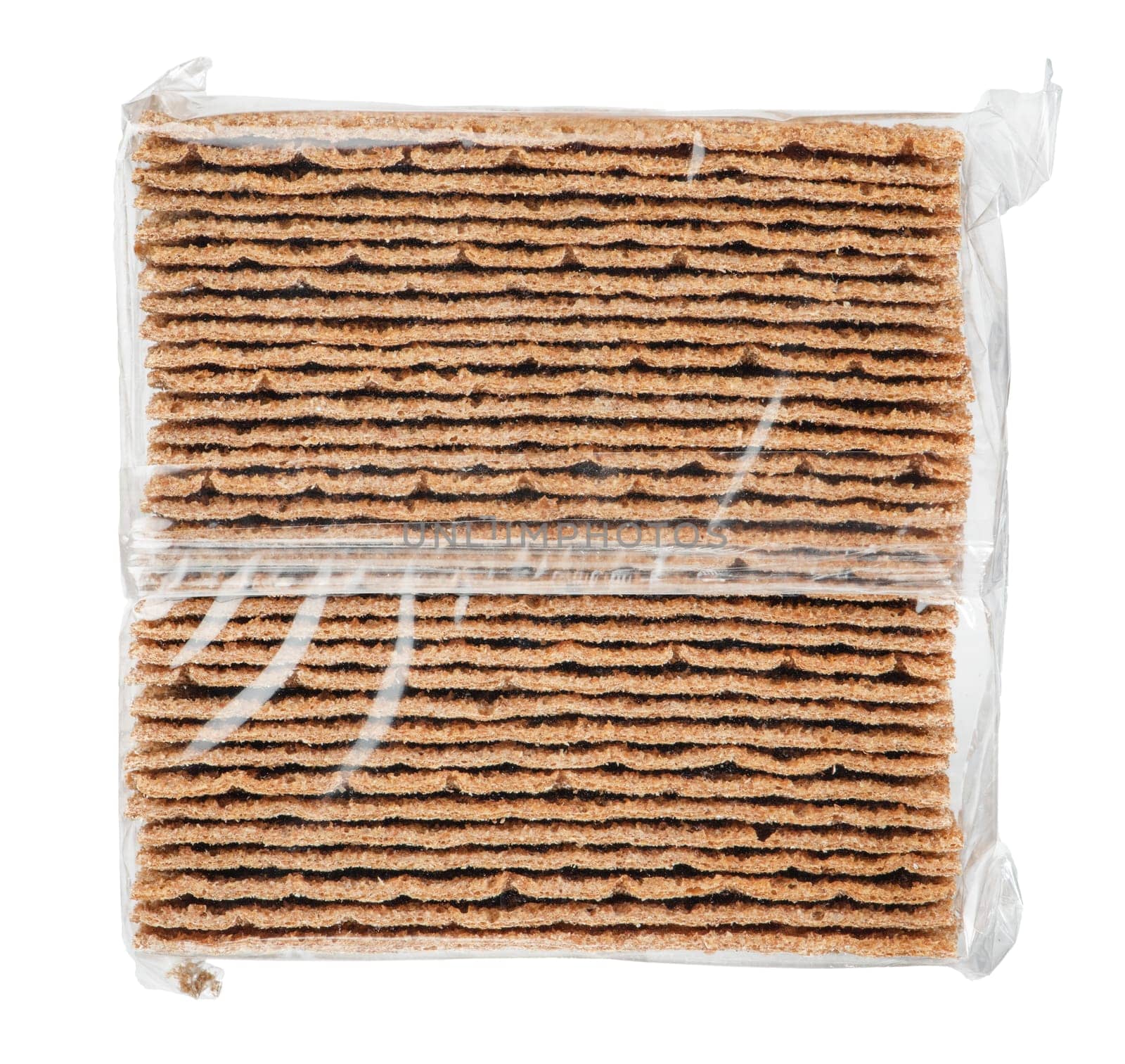 Rye chips on a white isolated background. Rye chips are packed in a transparent polythene package. Rye chips are a healthy alternative to potato and unhealthy chips. by SERSOL