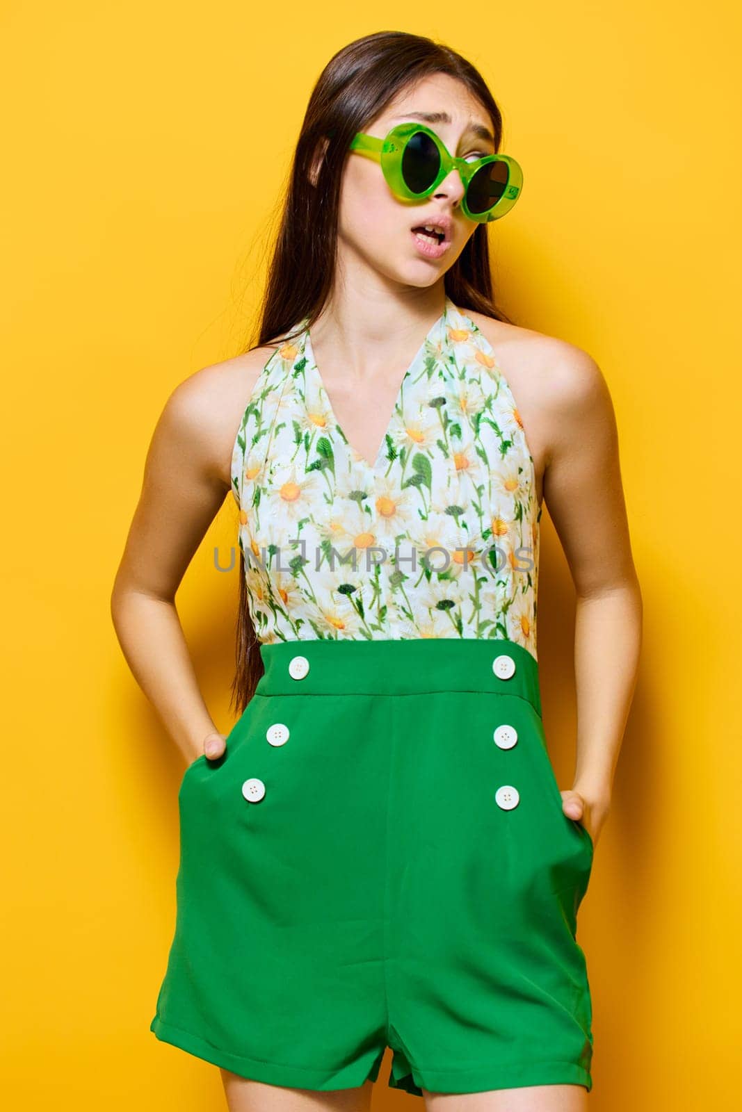 woman caucasian happy beautiful face attractive model jumpsuit smile style stylish young yellow brunet outfit sunglasses fashionable emotion beauty expression fashion