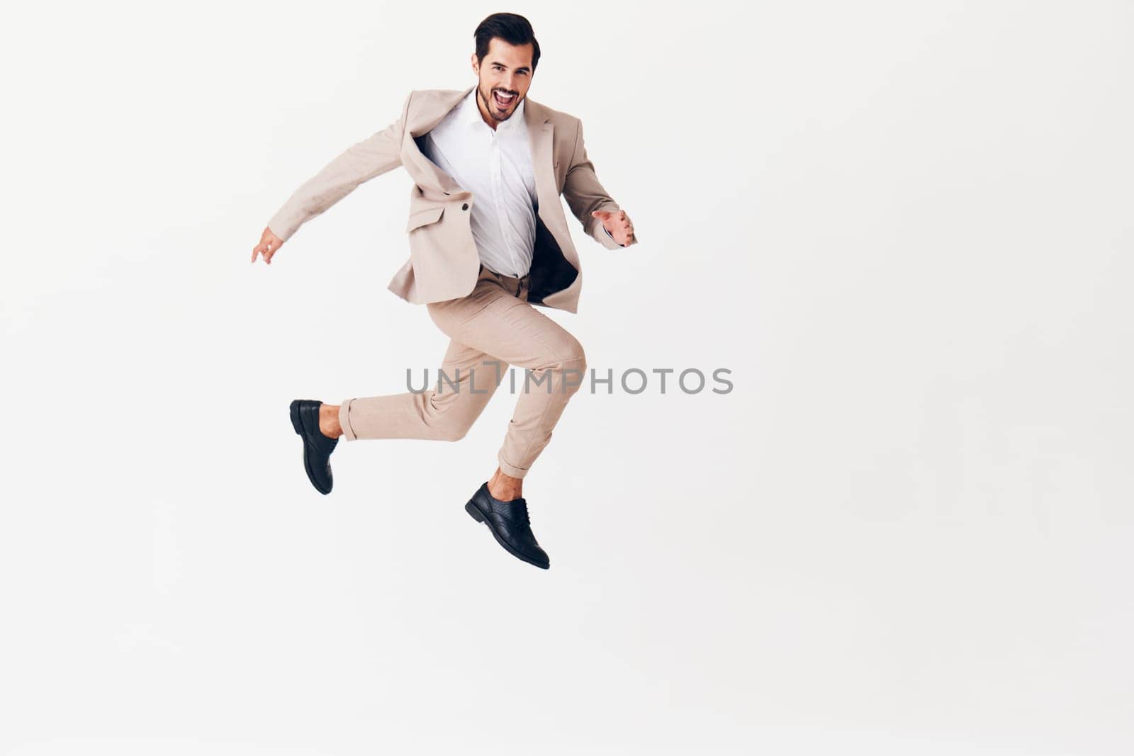 business man work person studio beige professional jumping victory male running success smiling background winner eyeglass occupation suit happy businessman up