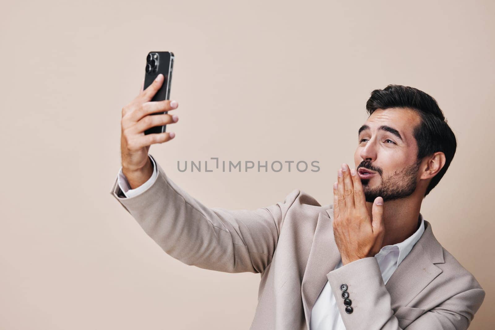 phone man suit hold portrait business happy smartphone white smile call by SHOTPRIME