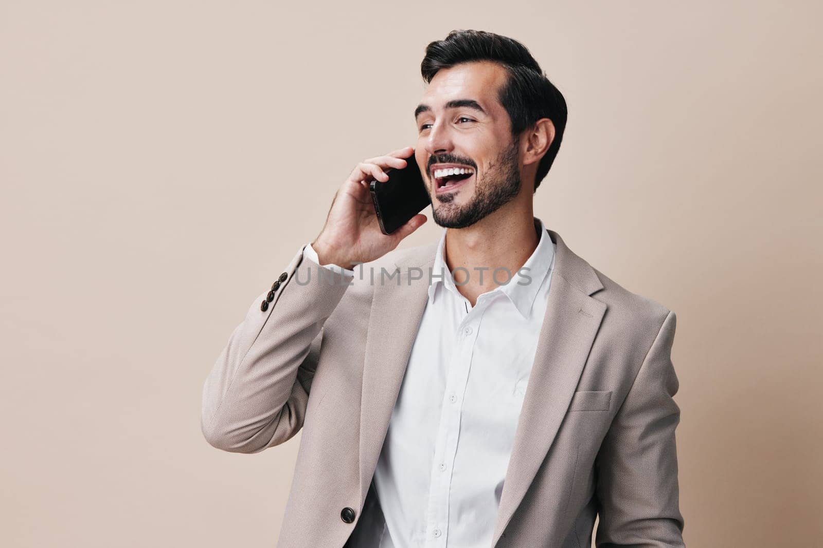 phone man suit smartphone hold smile mobile call application phone holding app internet mobile happy person selfies beige portrait business trading beard