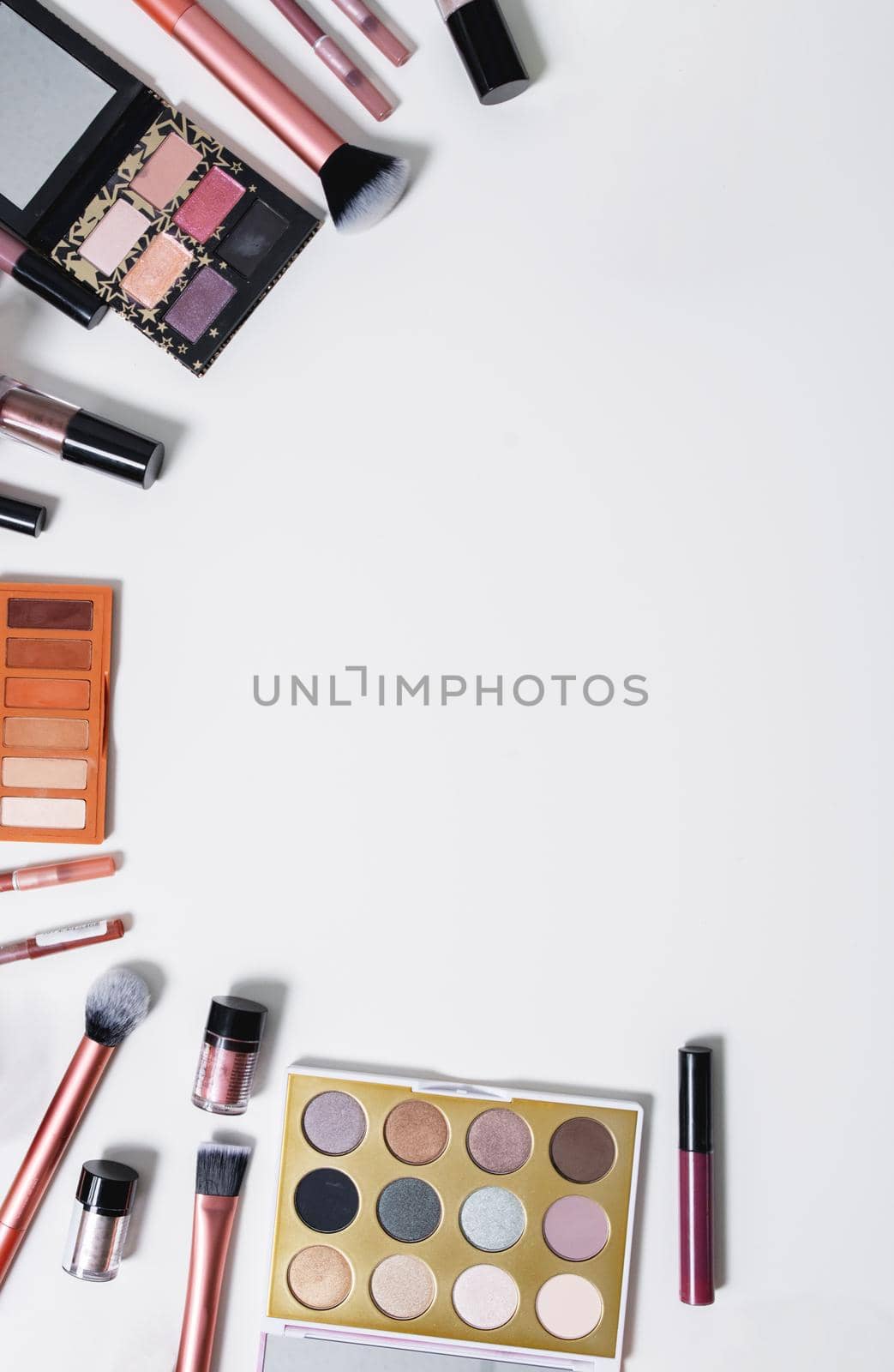 Decorative flat lay composition with cosmetics and copy space. Flat lay, top view on white background by Mariakray