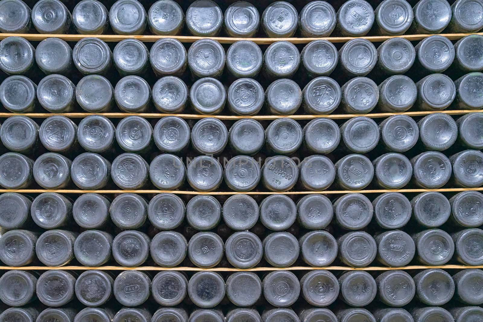 bottles of old wine in wine cellars. High quality photo