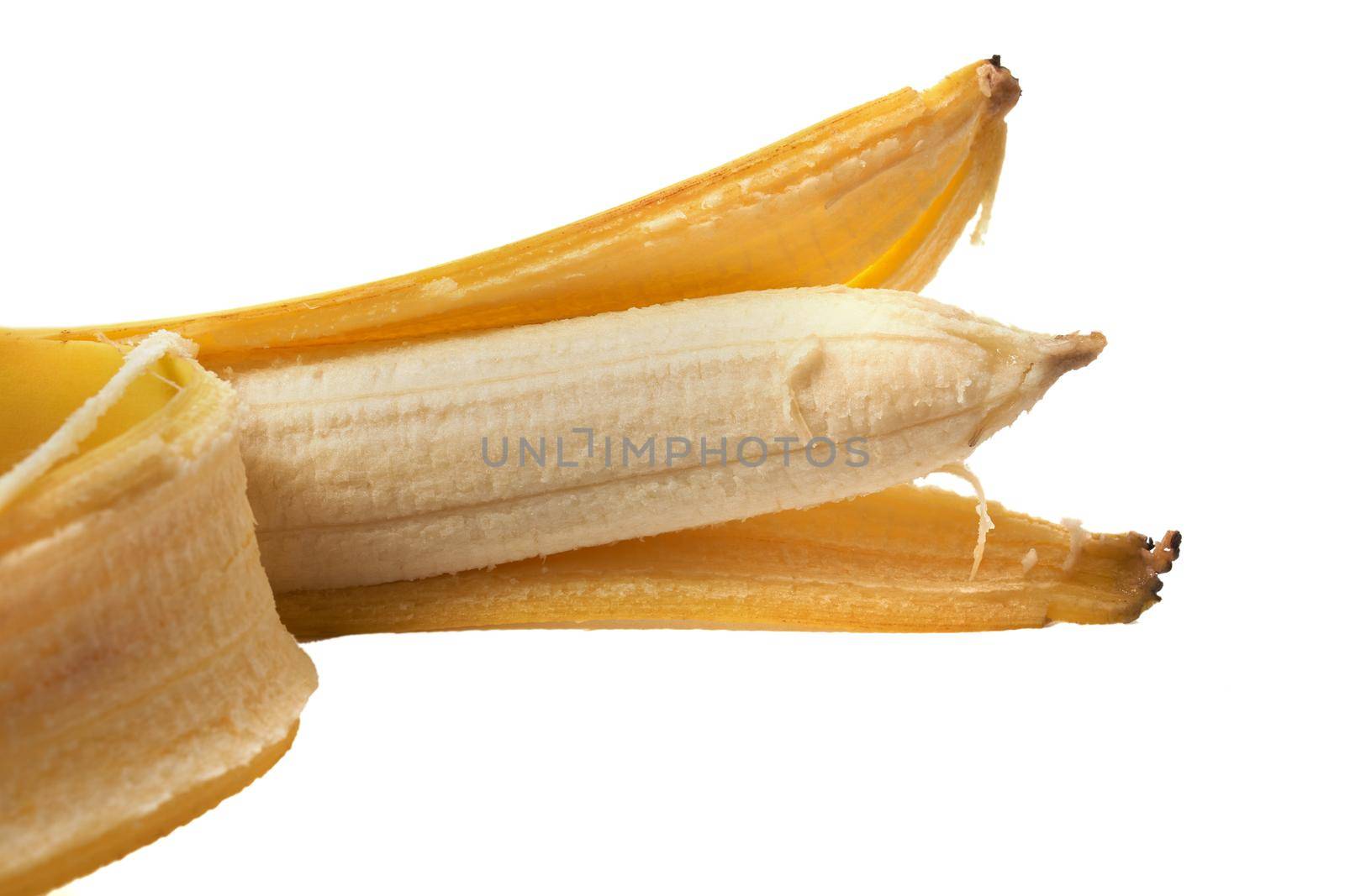 Peeled banana isolated on white. Banana slice