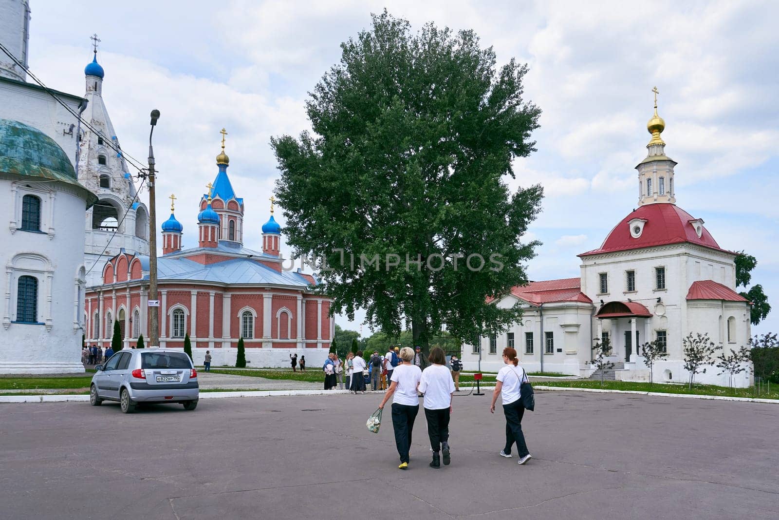 Kolomna, Russia - May 30, 2023: Tourists on the territory of the Kolomna Kremlin. Orthodox churches and old Russian architecture