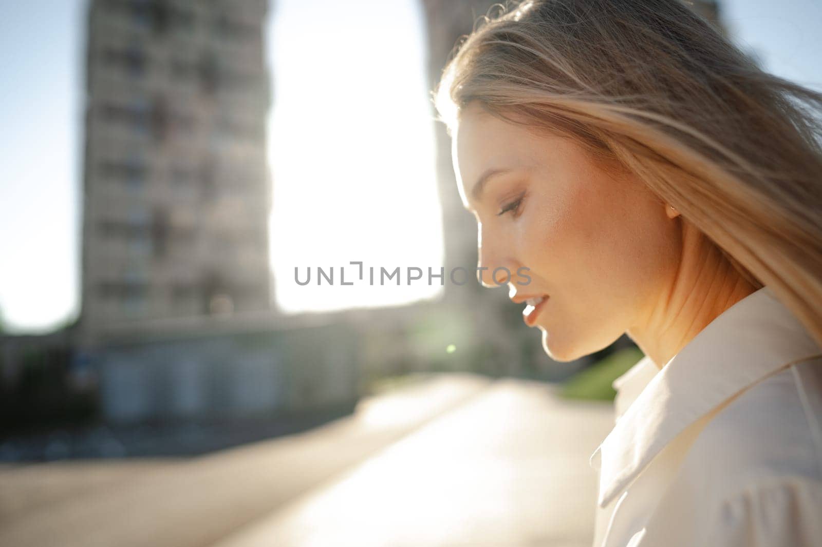 Close up portrait of young businesswoman outdoors by Fabrikasimf