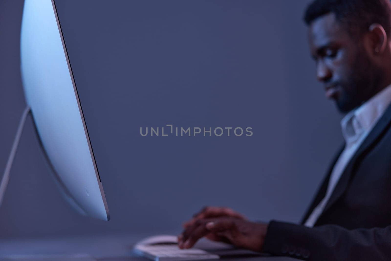 man lifestyle online african work freelancer keyboard evening business technology american night by SHOTPRIME