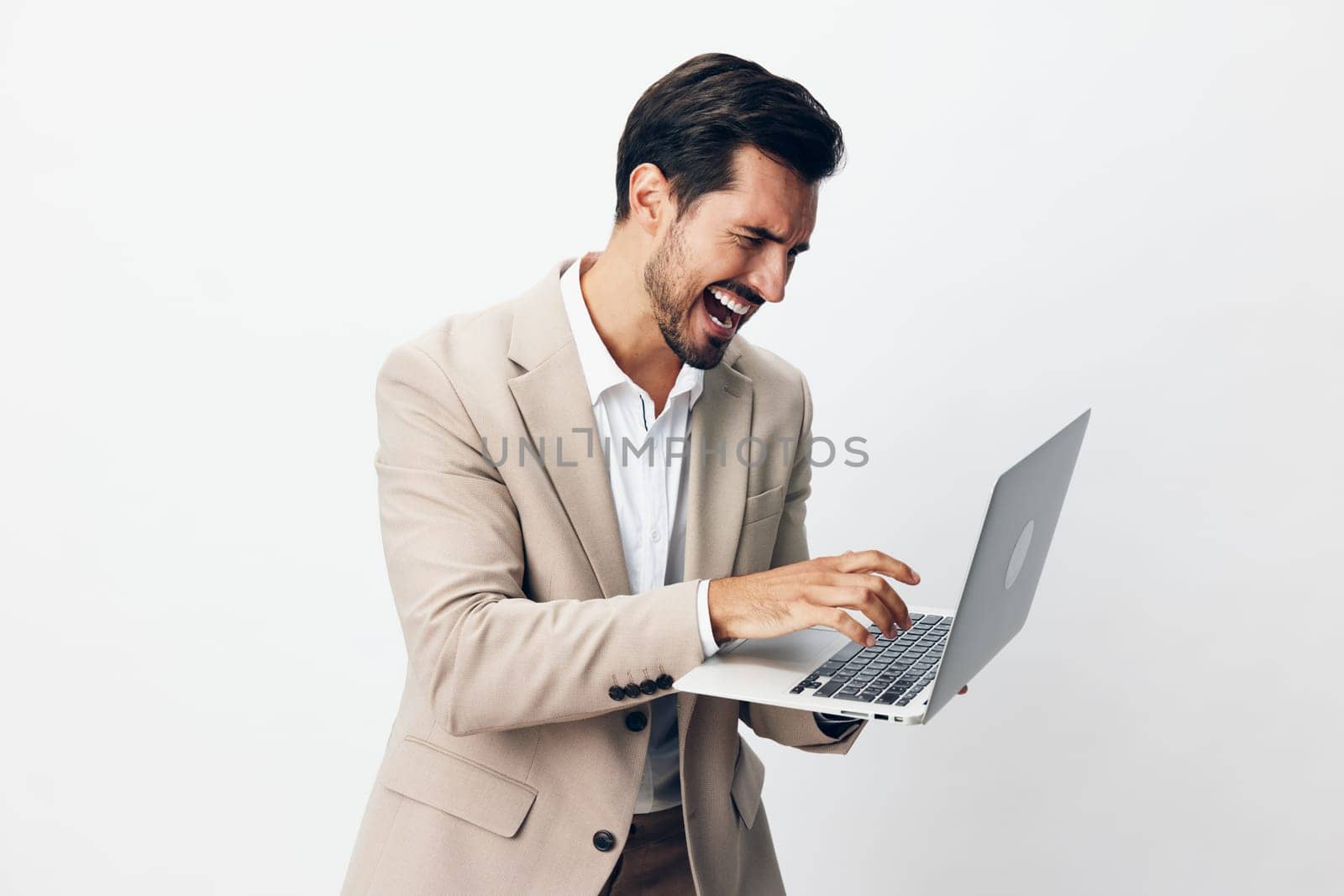 work man stylish job technology freelancer internet handsome model business notebook cyberspace laptop smile computer thoughtful online suit copyspace beige male