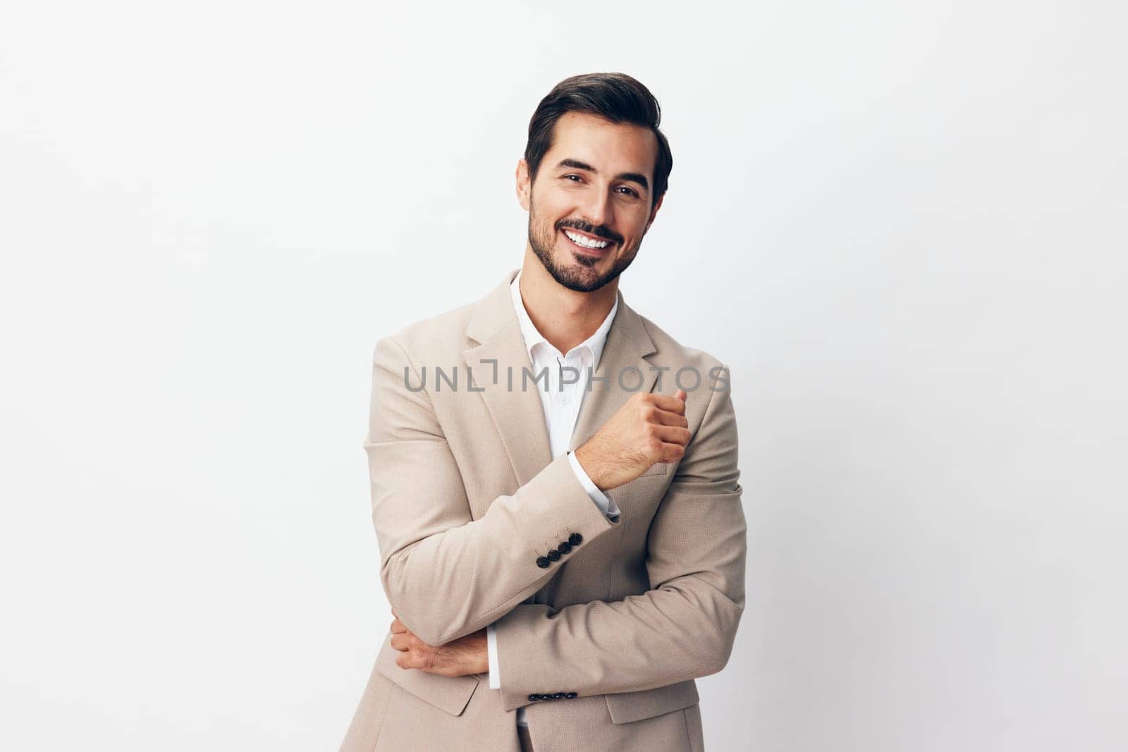 man businessman young portrait business executive happy smile tie success smiling stylish studio suit attractive copyspace crossed handsome eyeglass isolated beige