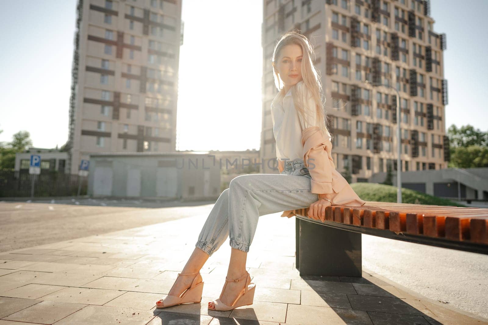 Close up portrait of young blonde businesswoman outdoors