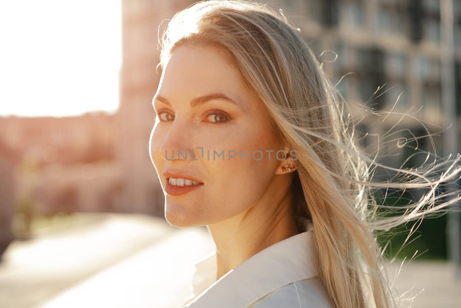 Close up portrait of young businesswoman outdoors by Fabrikasimf