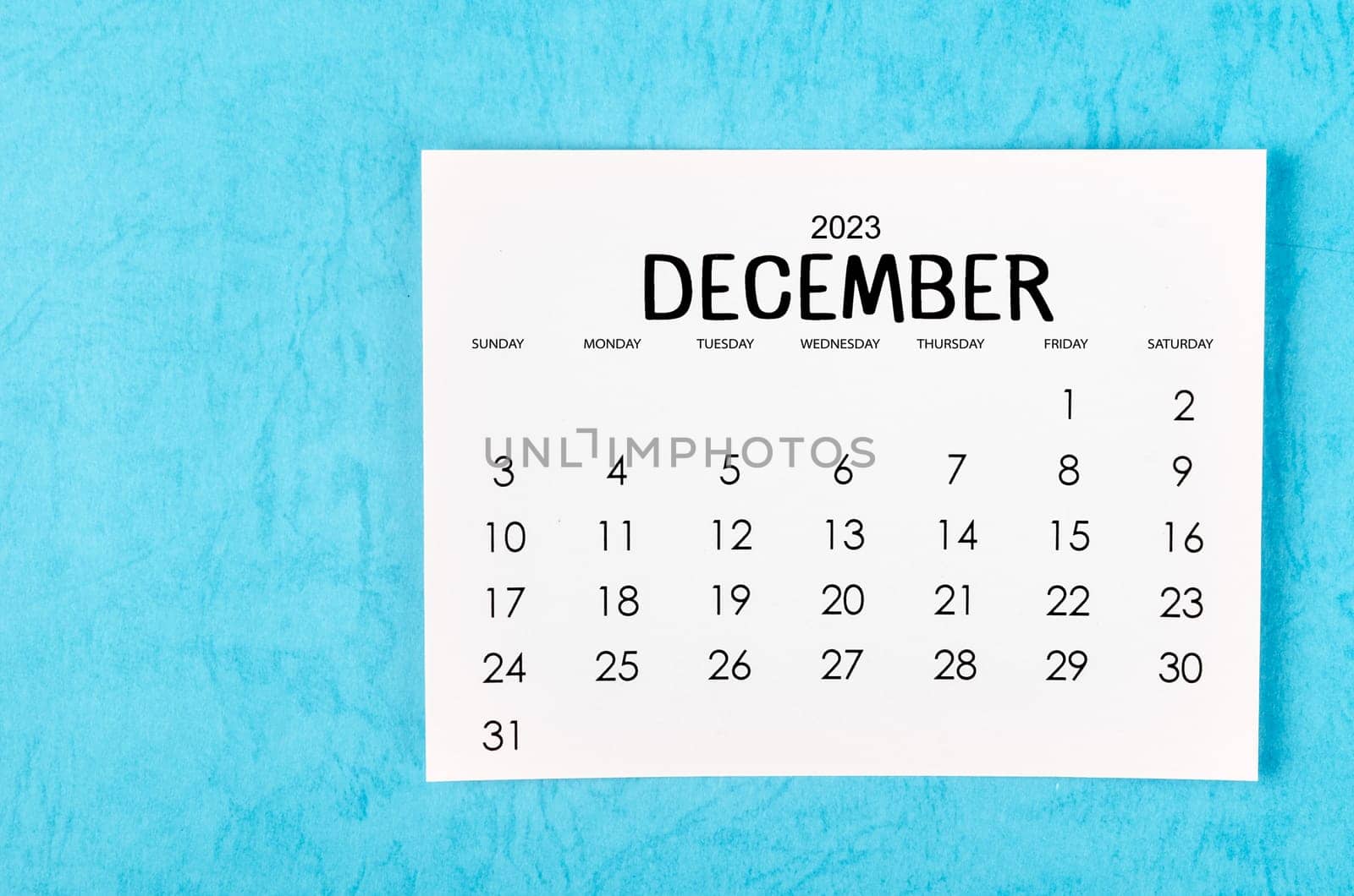 Decmber 2023 Monthly calendar for 2023 year on blue background.