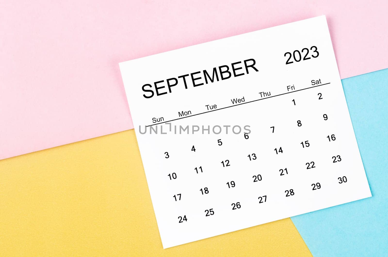 The September 2023 Monthly calendar on colorful background. by Gamjai