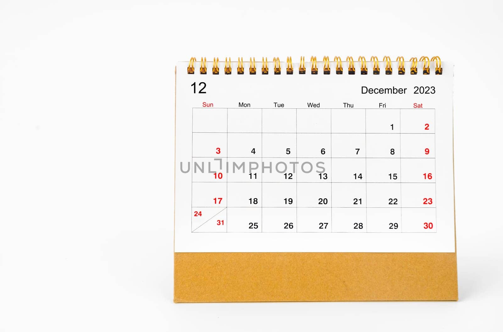 The December 2023 Monthly desk calendar for 2023 year isolated on white background. by Gamjai