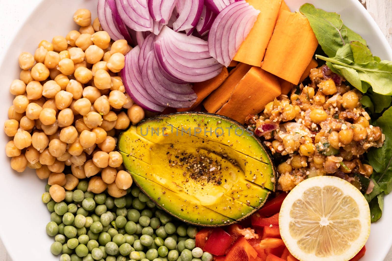 Overhead view of fresh healthy meal with various food in bowl by Wavebreakmedia