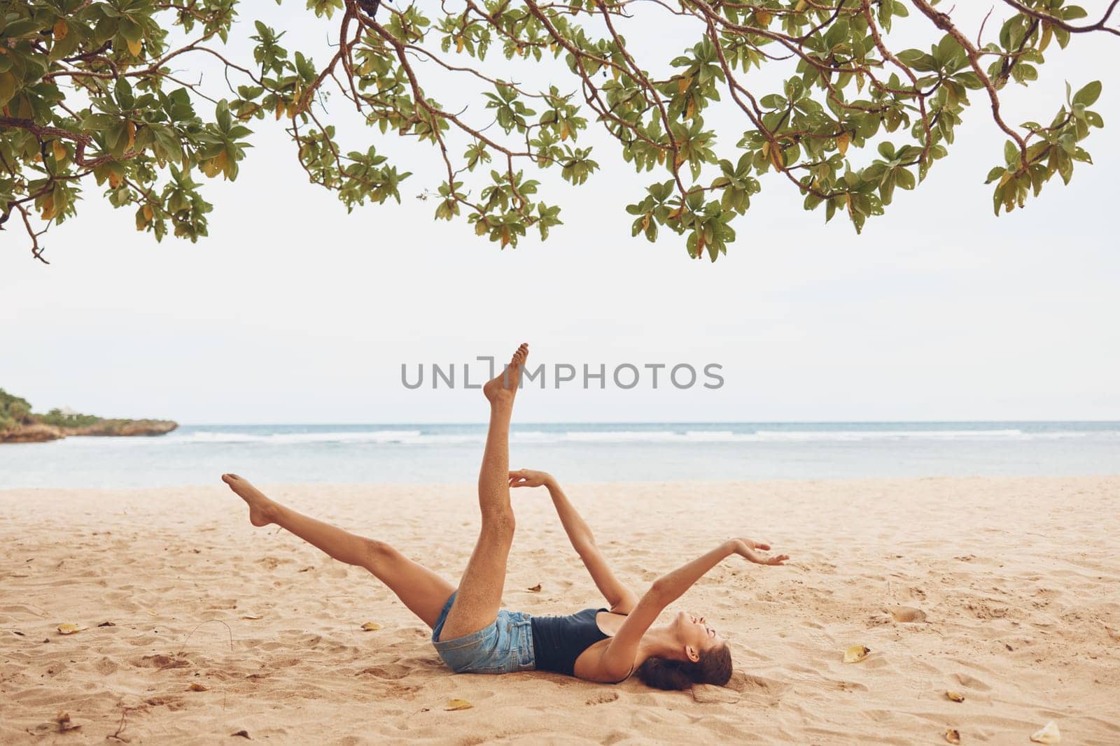 beach woman nature sea sitting vacation travel freedom body smile sand by SHOTPRIME