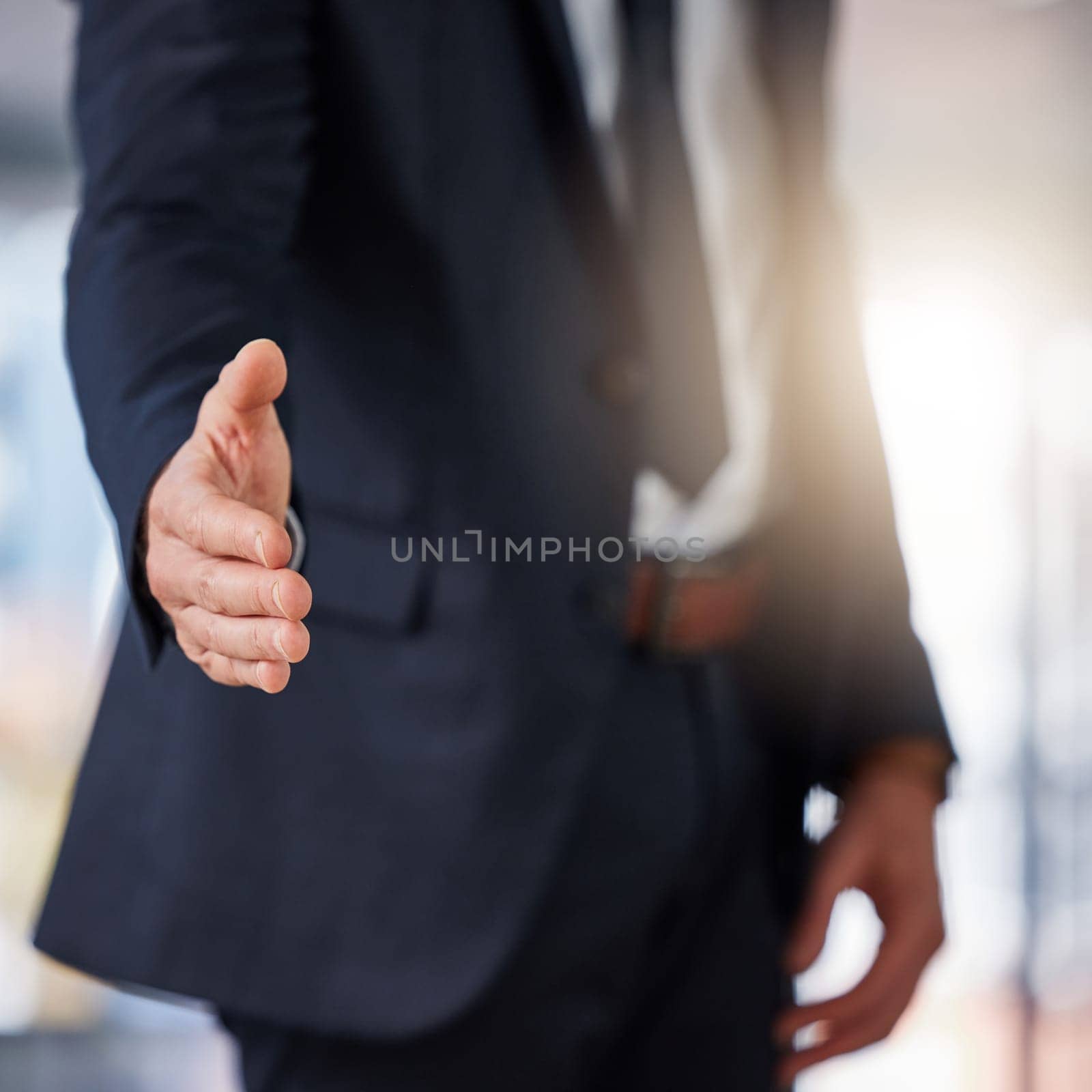 Businessman, handshake and deal in meeting for hiring, partnership or b2b agreement at the office. Man employee shaking hands for business welcome, recruiting or introduction to job at the workplace.