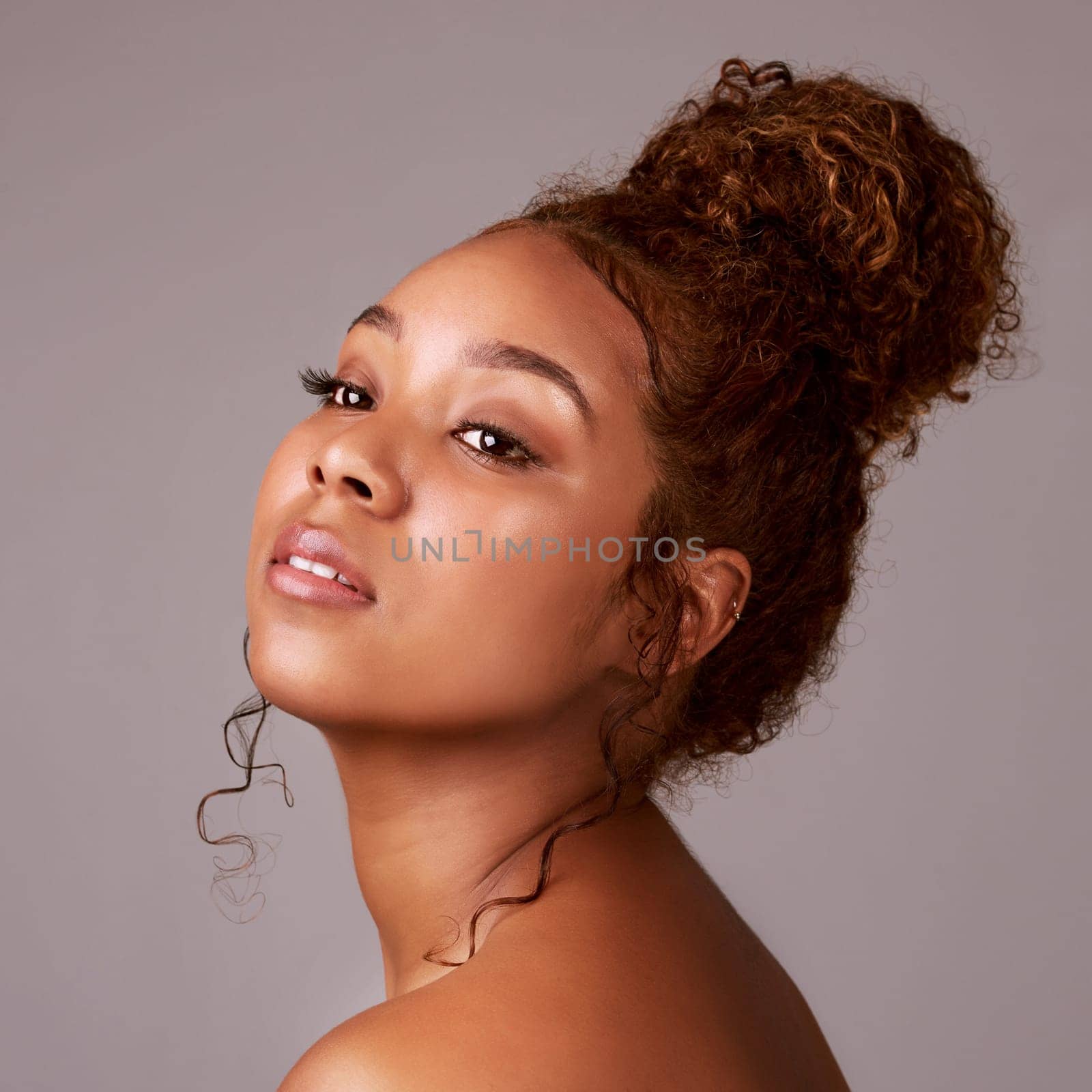 Natural, skincare and hair with woman in studio for dermatology, cosmetics or makeup. Facial, beauty and glow with face of female model isolated on background for spa mockup, self care or shine.