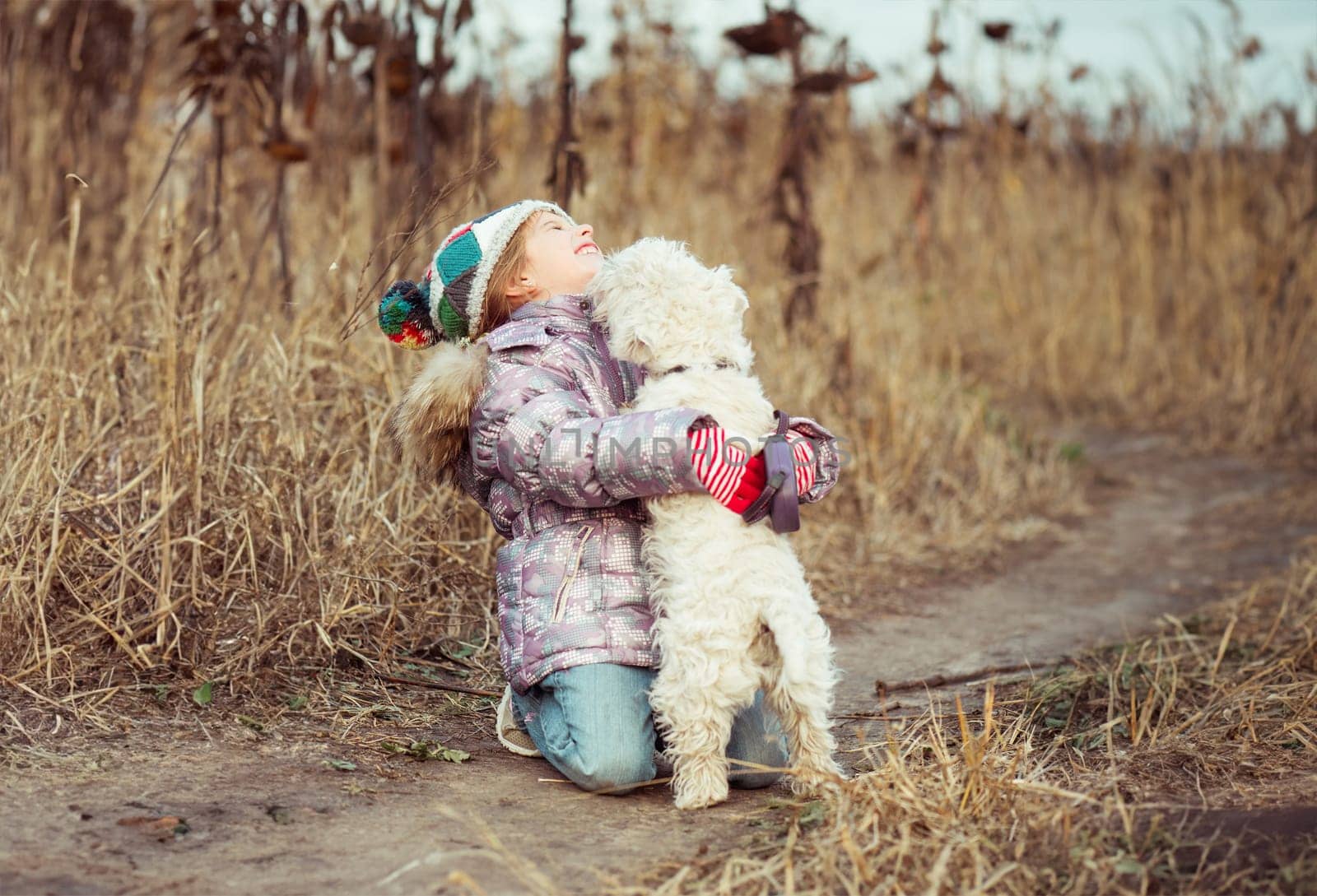 little girl with her dog by tan4ikk1