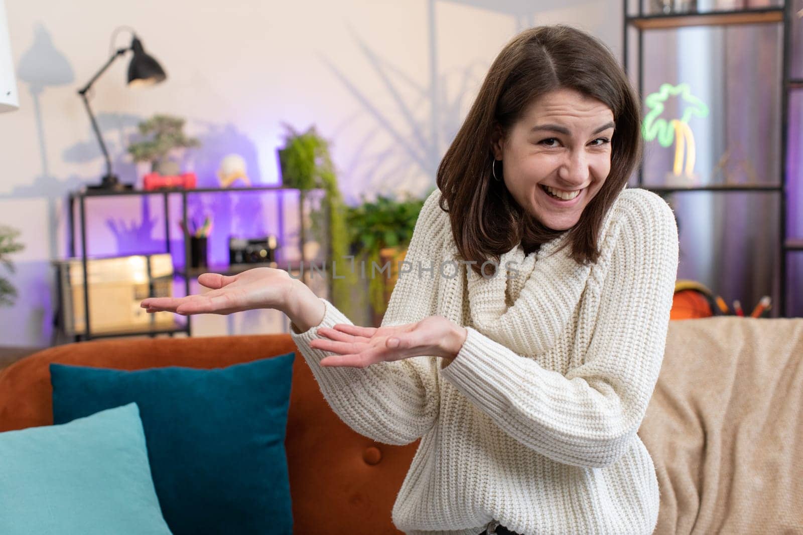Woman raising hands asking what why reason of failure, demonstrating disbelief irritation by troubles trendy social media meme anti lifehacks ridicules people who complicate simple tasks for no reason