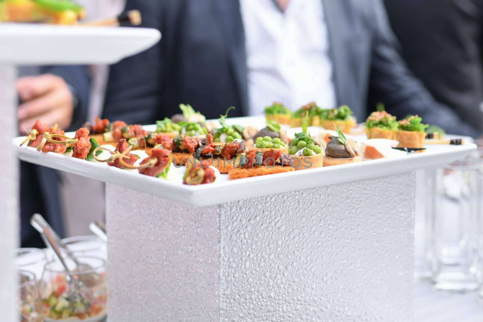 Small Canapes appetizers at the wedding