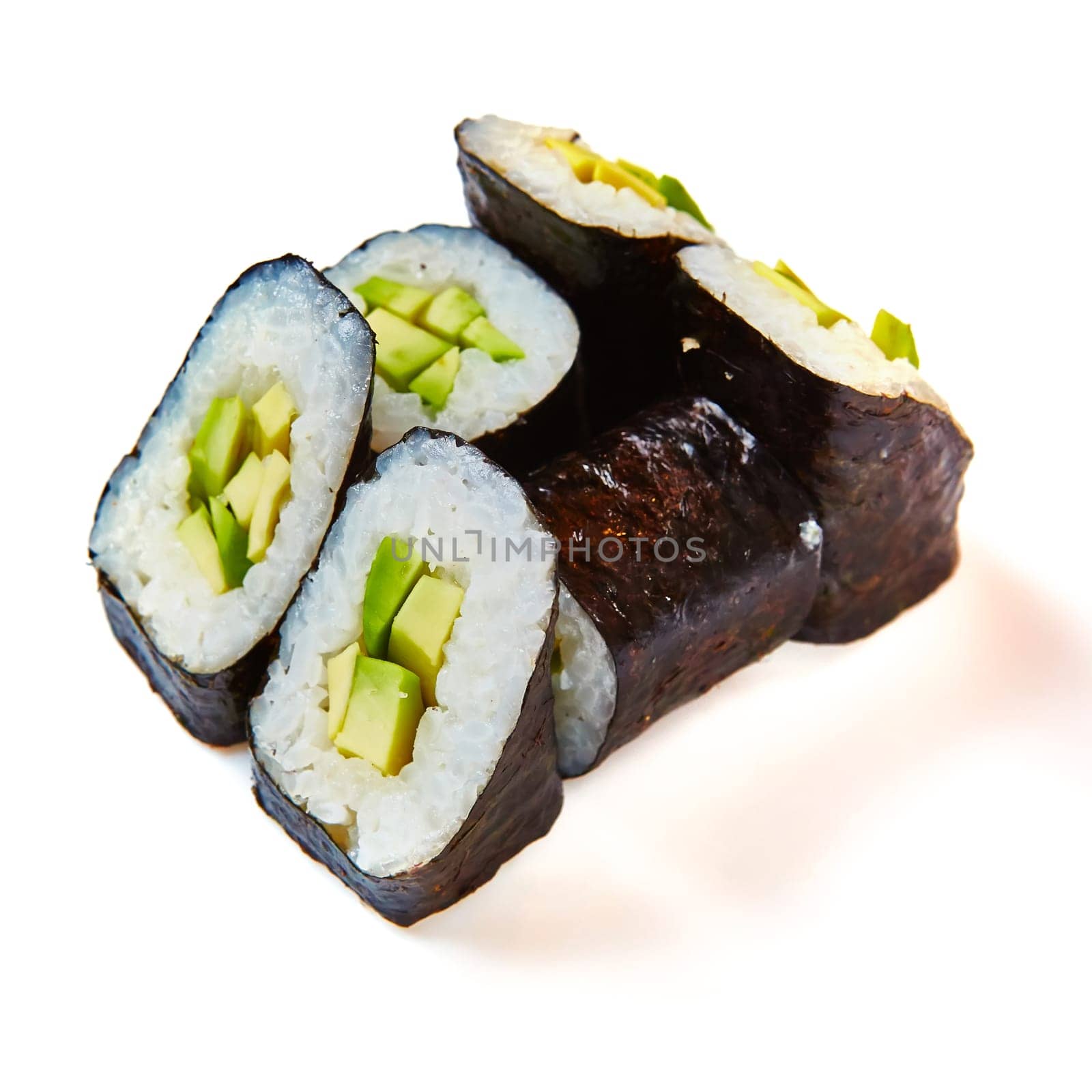 Japanese cuisine. Sushi roll with avocado on white background.