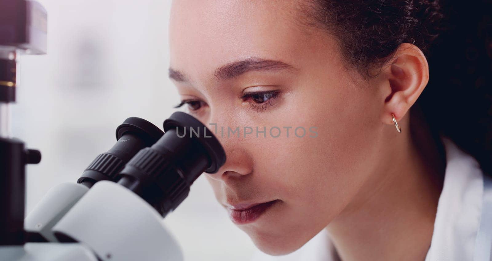 Science, face and microscope with woman in laboratory for expert research, medical and planning. Test, vaccine analysis and medicine with female scientist for chemistry, healthcare and pharmacy.