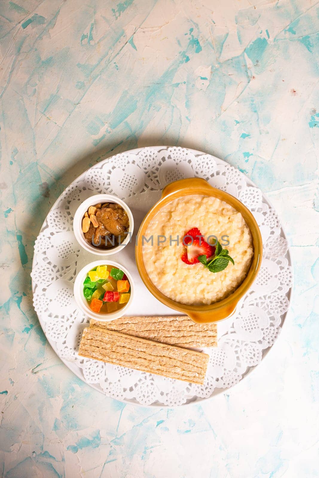 healthy breakfast. porridge with berries and loaves top view.