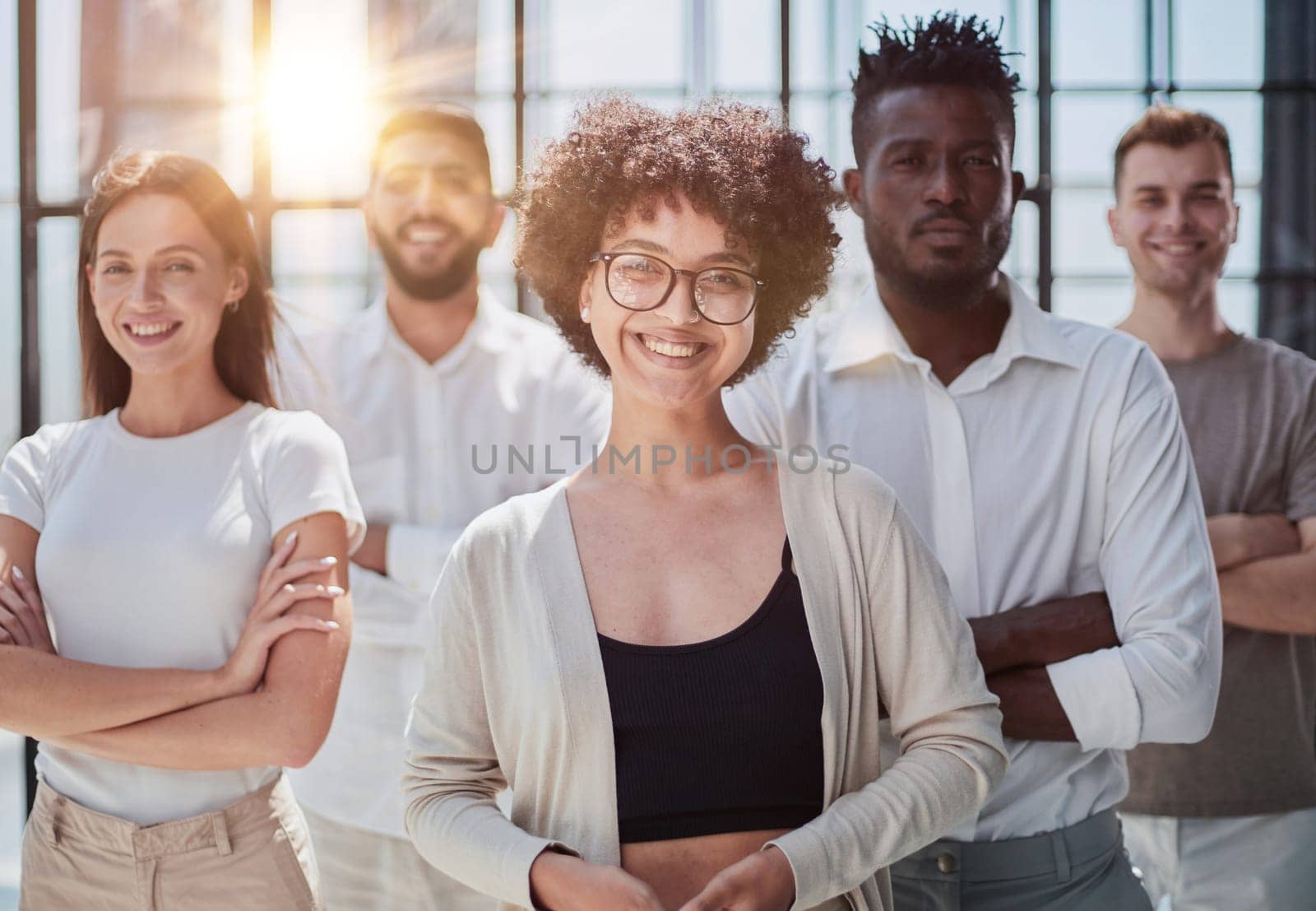 Face of beautiful woman on the background of business people