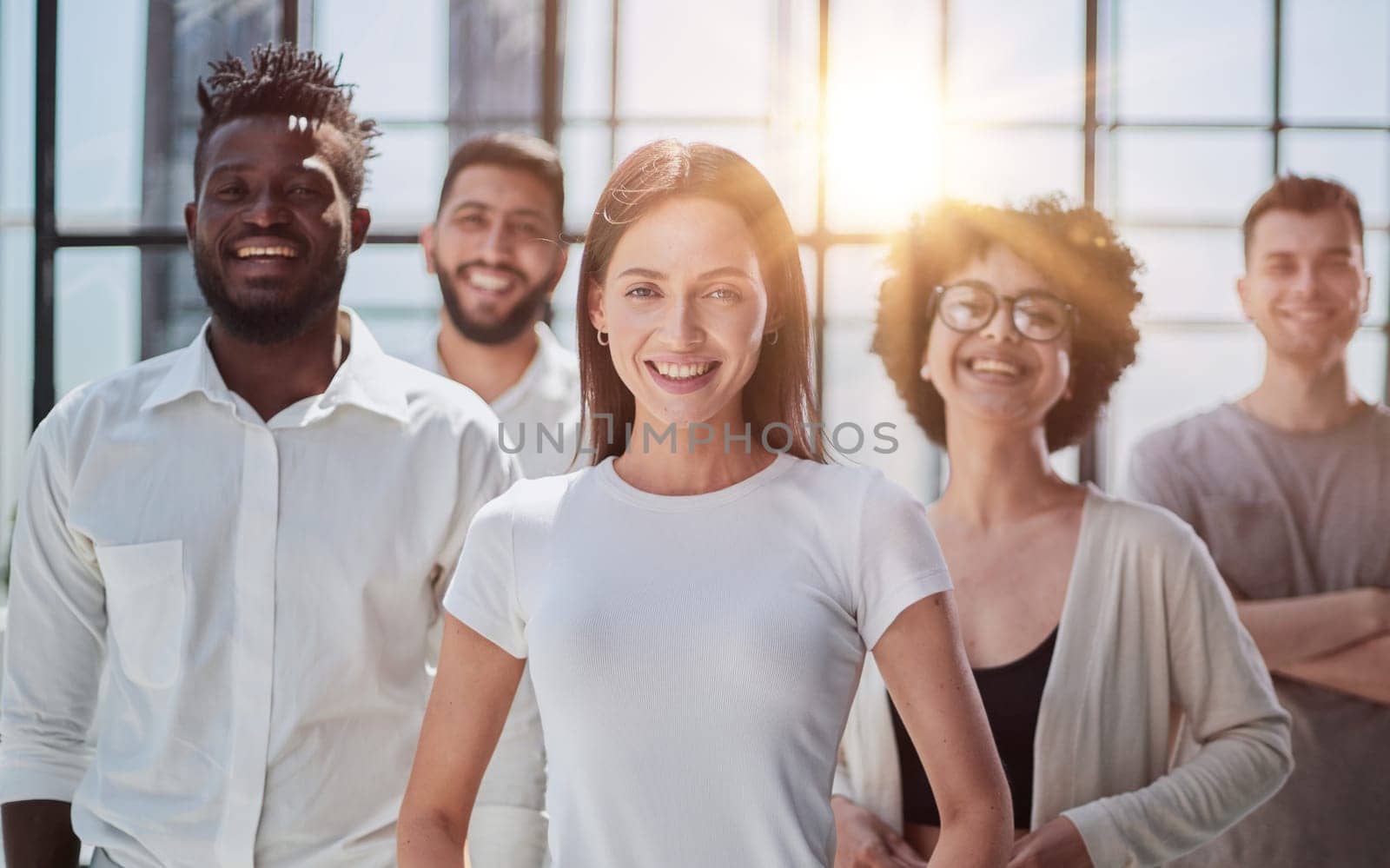 Face of beautiful woman on the background of business people