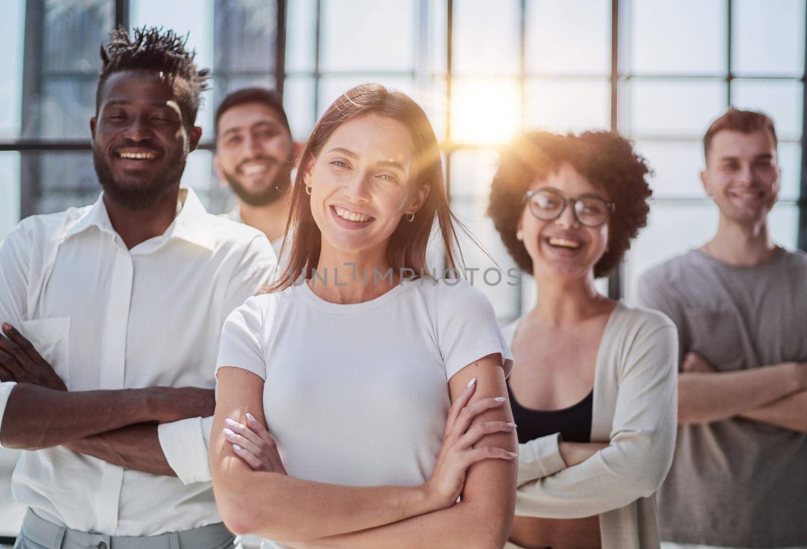 Face of beautiful woman on the background of business people