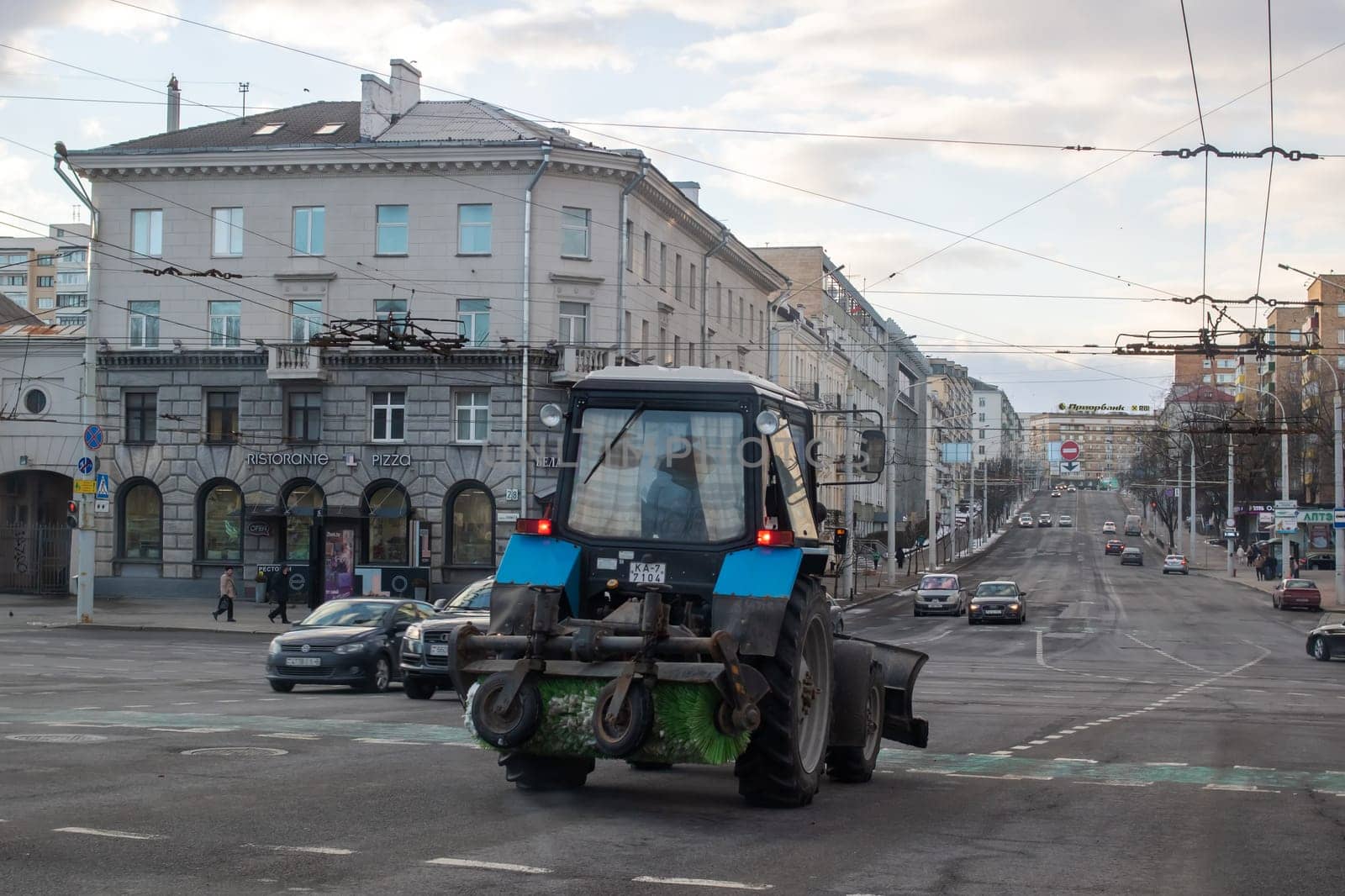 Belarus, Minsk - 08 march, 2023: Tractor on the road close up