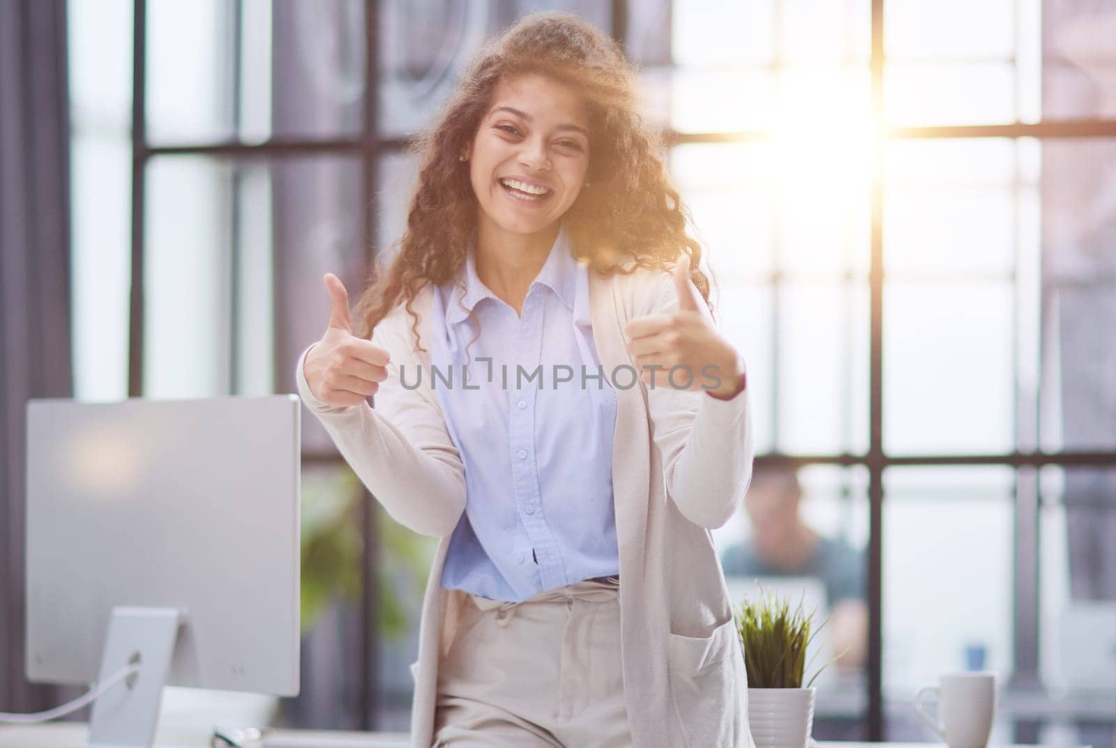 Photo of happy web designer look camera show thumb up