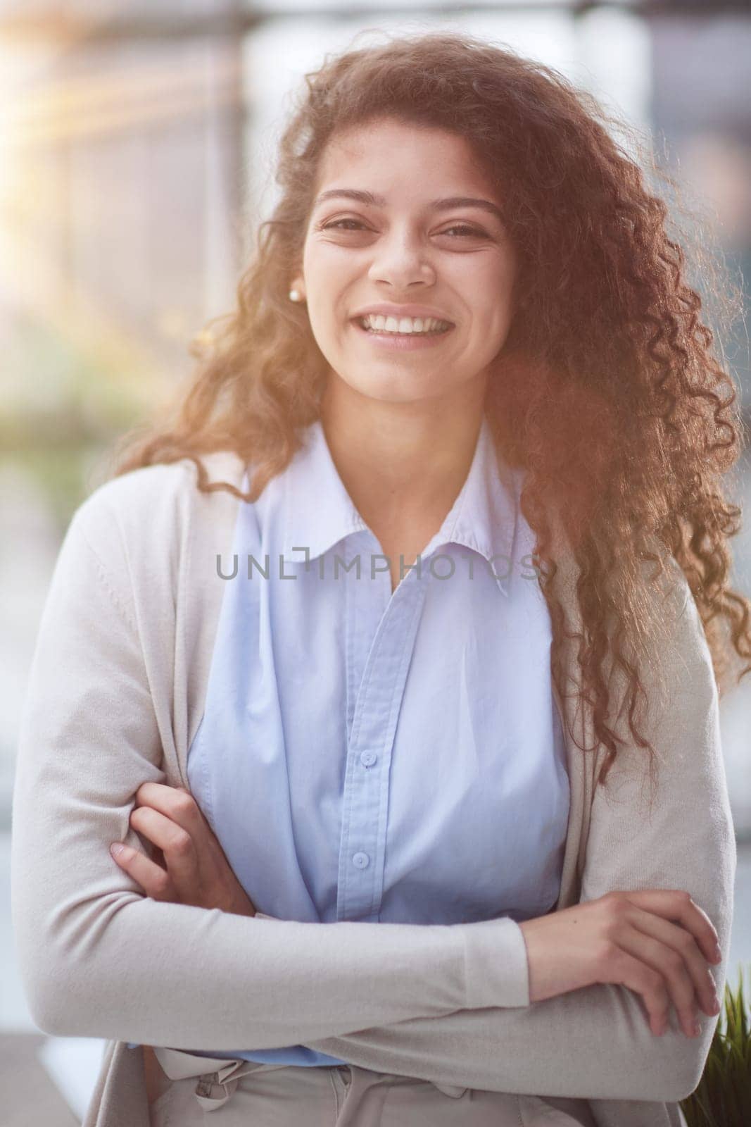 girl standing at modern office looking at camera