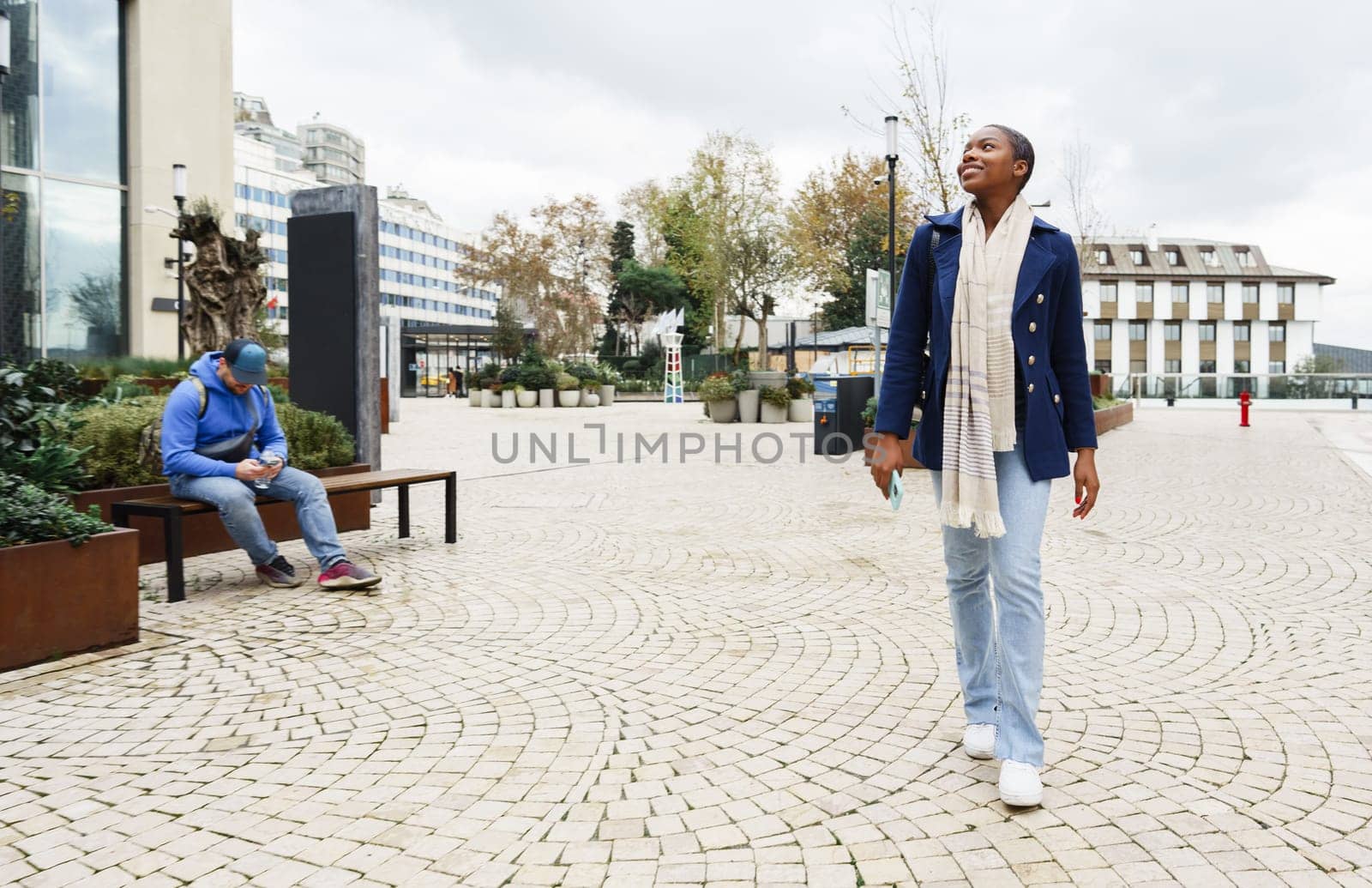 Attractive young african woman walking in the city of Istanbul