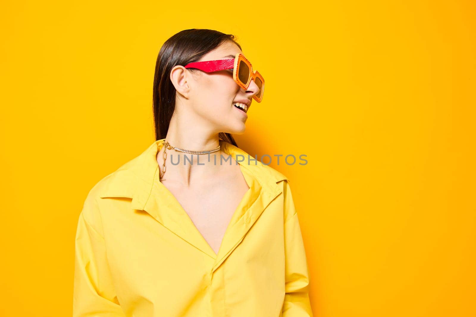girl woman young person modern lifestyle glamour fashion beautiful attractive studio dance monochrome positive romance trendy sunglasses yellow isolated expression joy