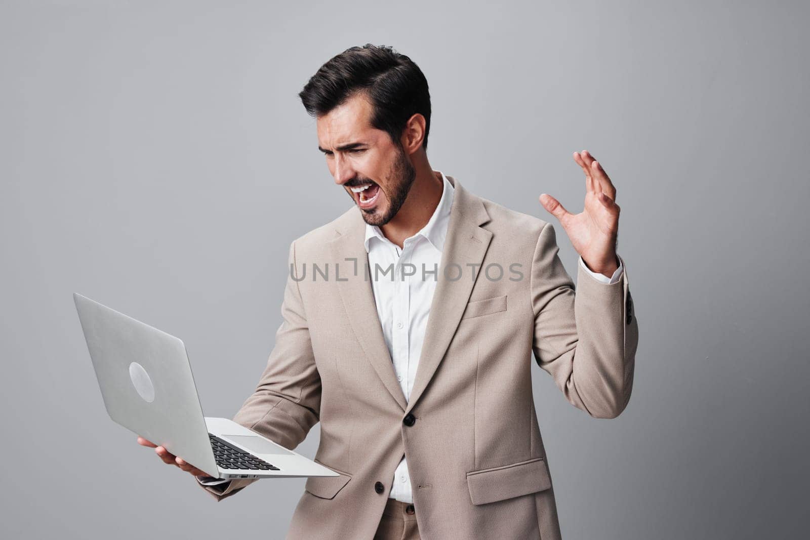 notebook man smiling business manager suit laptop network copyspace wireless computer young cheerful internet using freelancer technology job studio digital adult