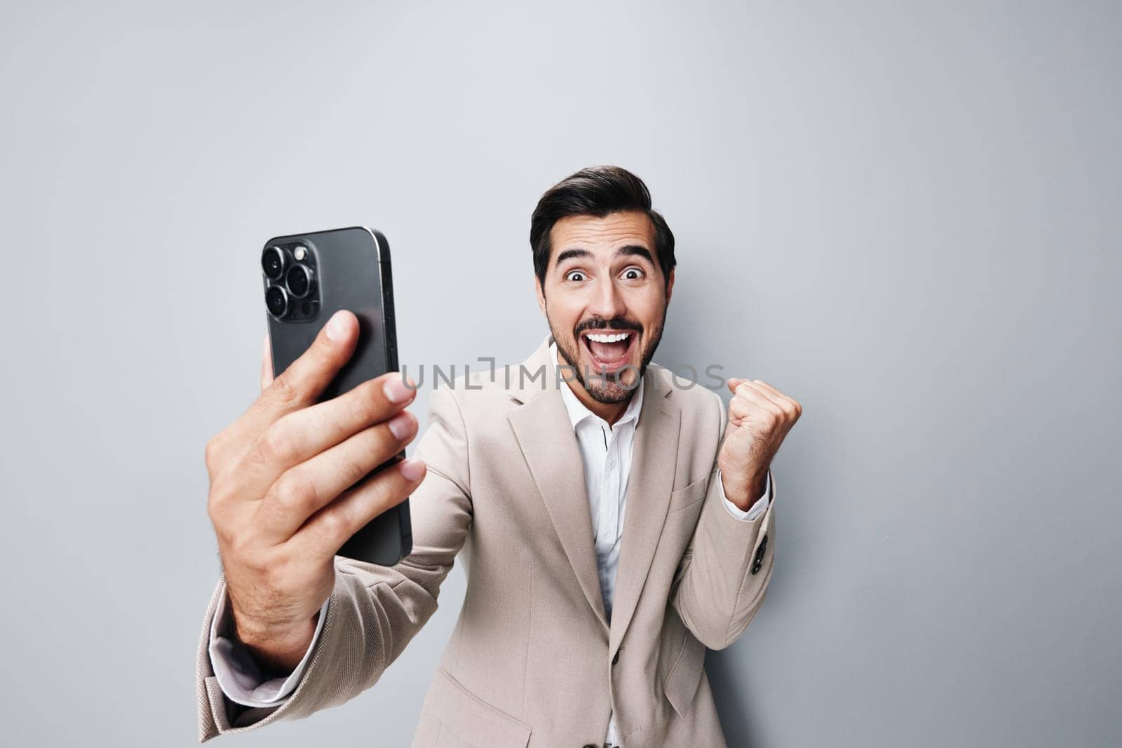 smile man suit call phone person hold portrait happy business smartphone by SHOTPRIME