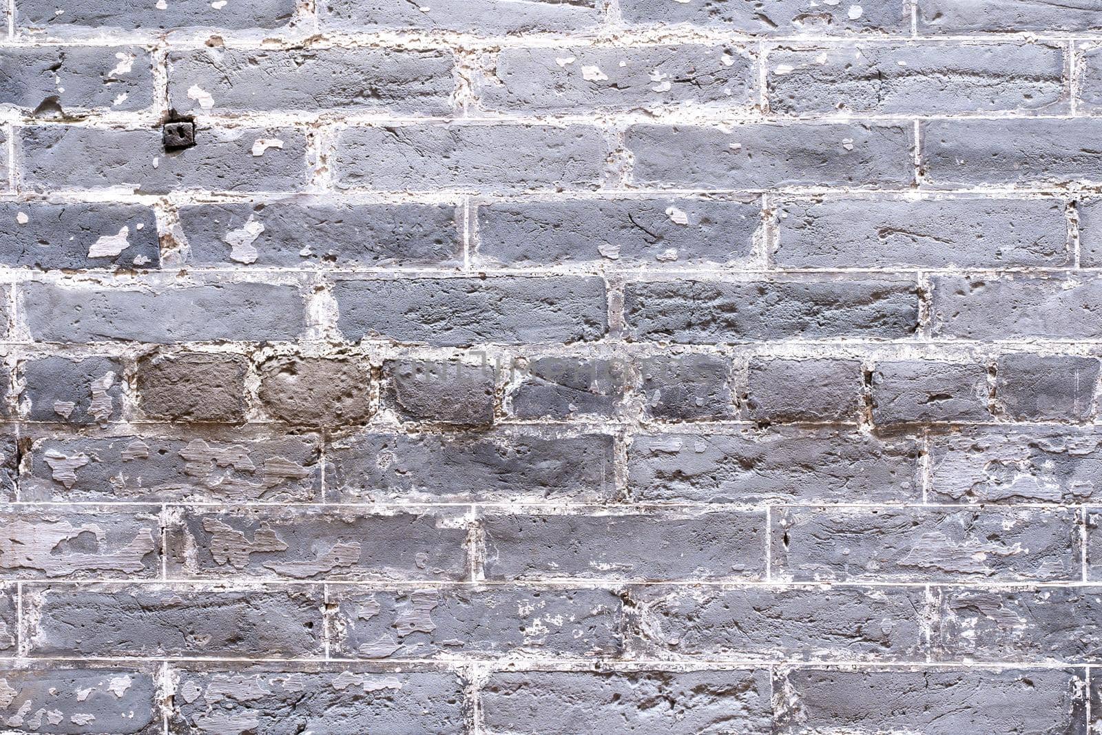 Real gray antique retro brick tone, pattern wall background in an old chinese house, close up, flat lay, top front view.