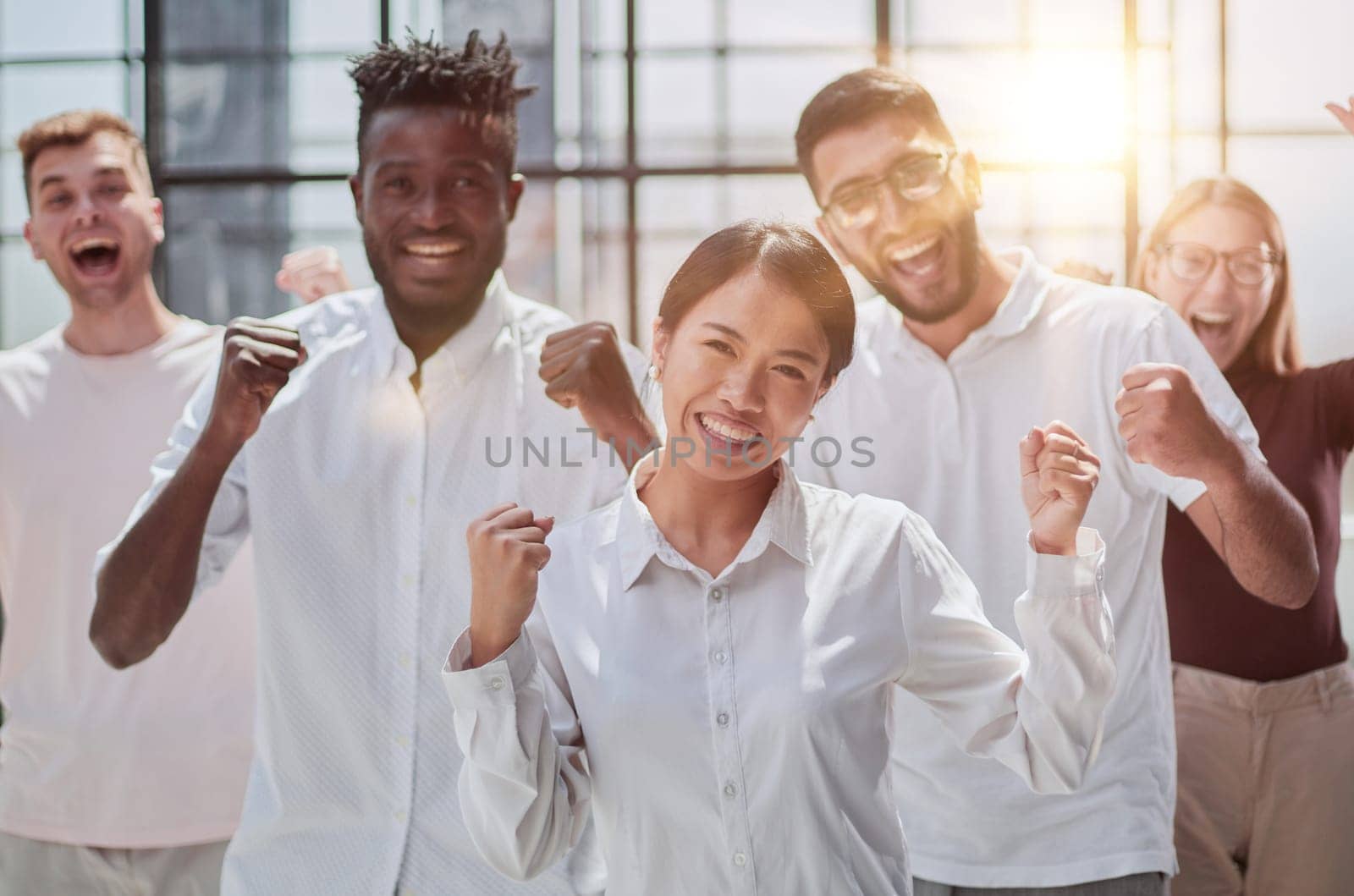 Business people looking at the camera during a business meeting in a modern office