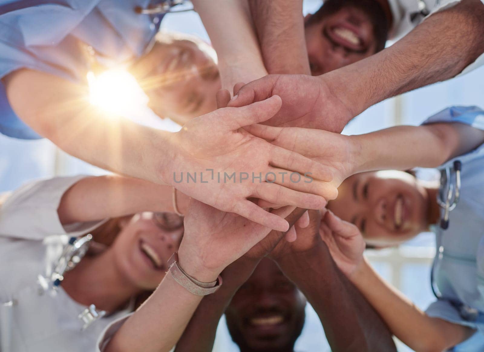 Professional Doctors Holding Each Other Hands. Multinational Medician Meeting.