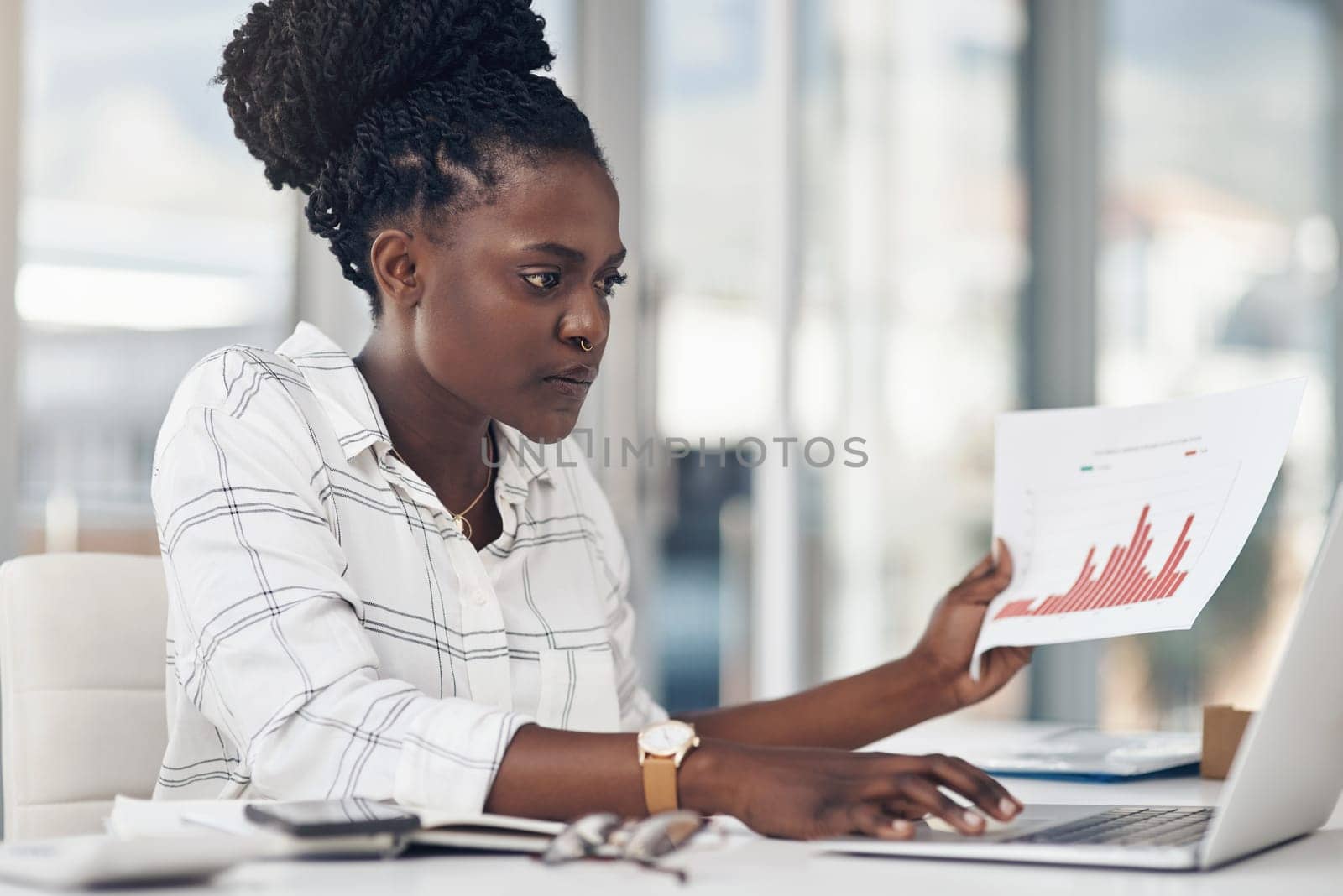 Laptop, documents and woman with data analysis, seo research or website statistics review, focus and planning. Financial analytics and paperwork of african person on computer, web charts and graphs by YuriArcurs