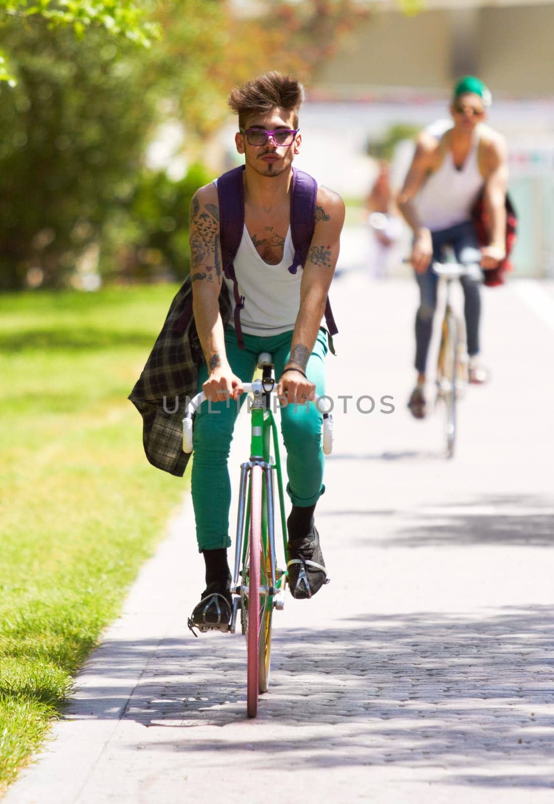 Bicycle, portrait and man or friends in city streetwear for college, university or outdoor travel in carbon footprint. Youth cycling or people in gen z fashion, bike for transport and park or campus by YuriArcurs