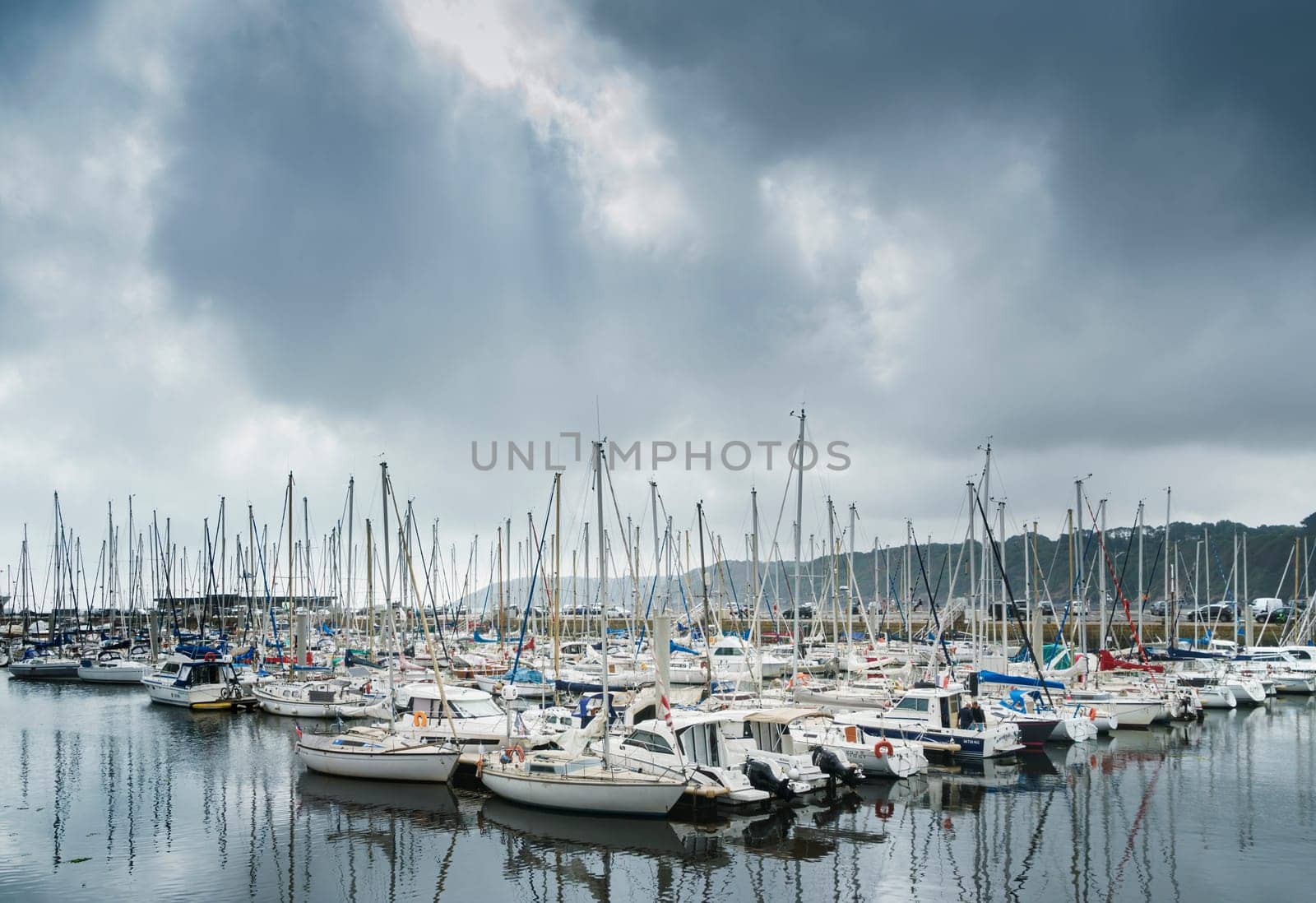 View of the harbor of the French village of Binic with pleasure boats and yachts at anchor.